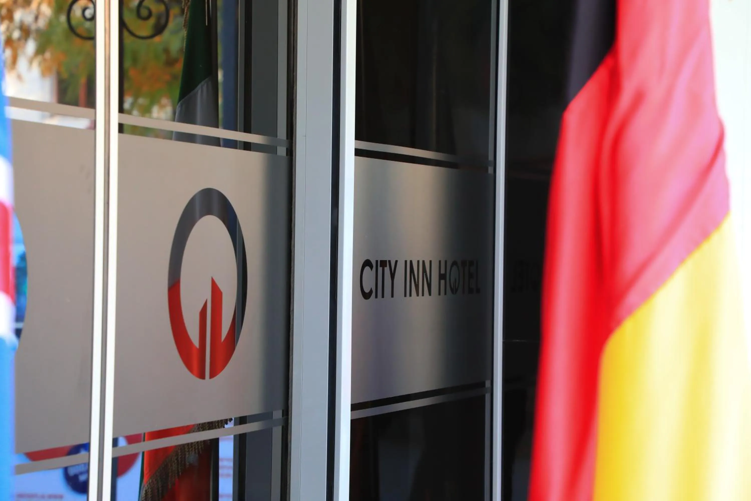 Property logo or sign in City INN Hotel