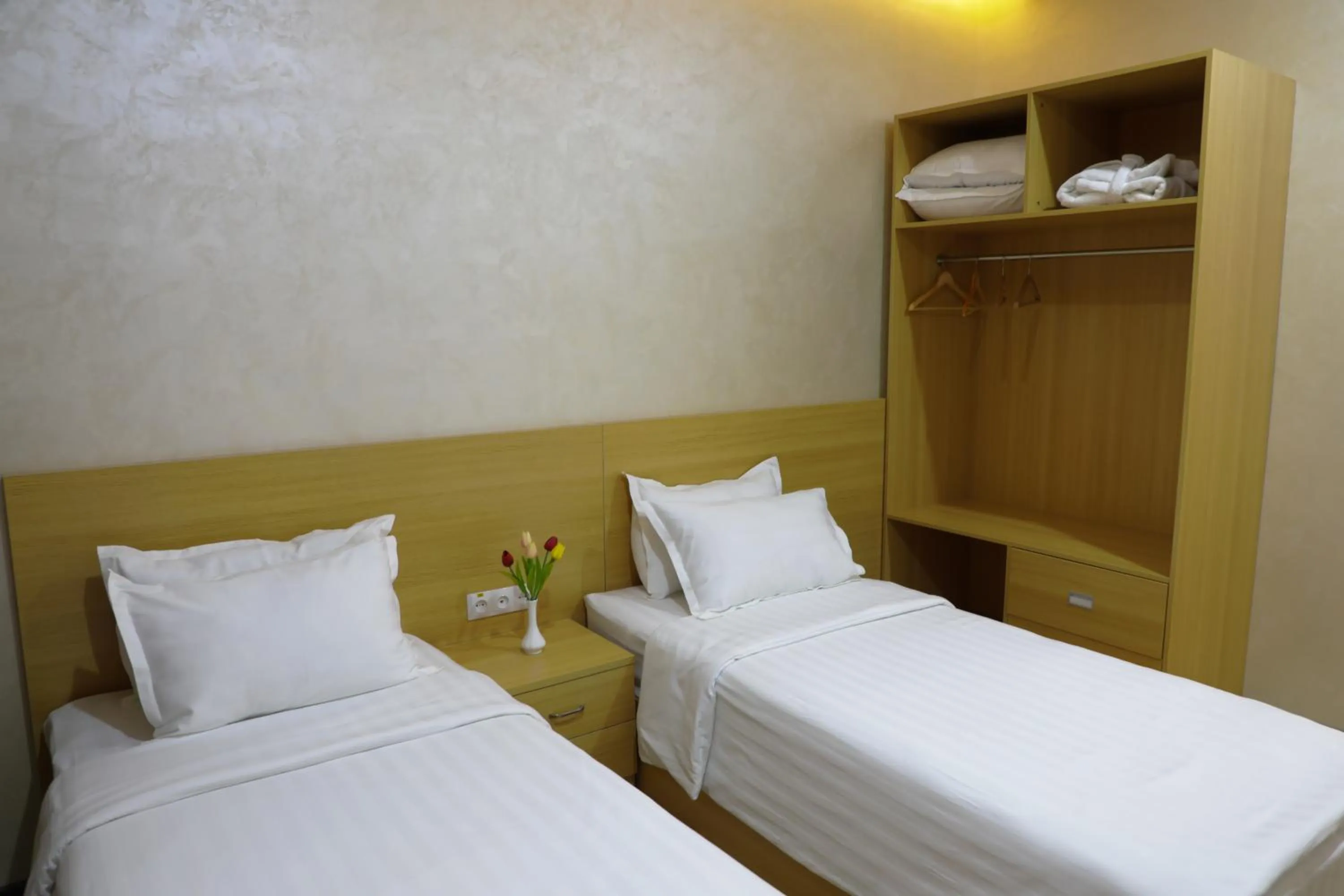 Bed in City INN Hotel