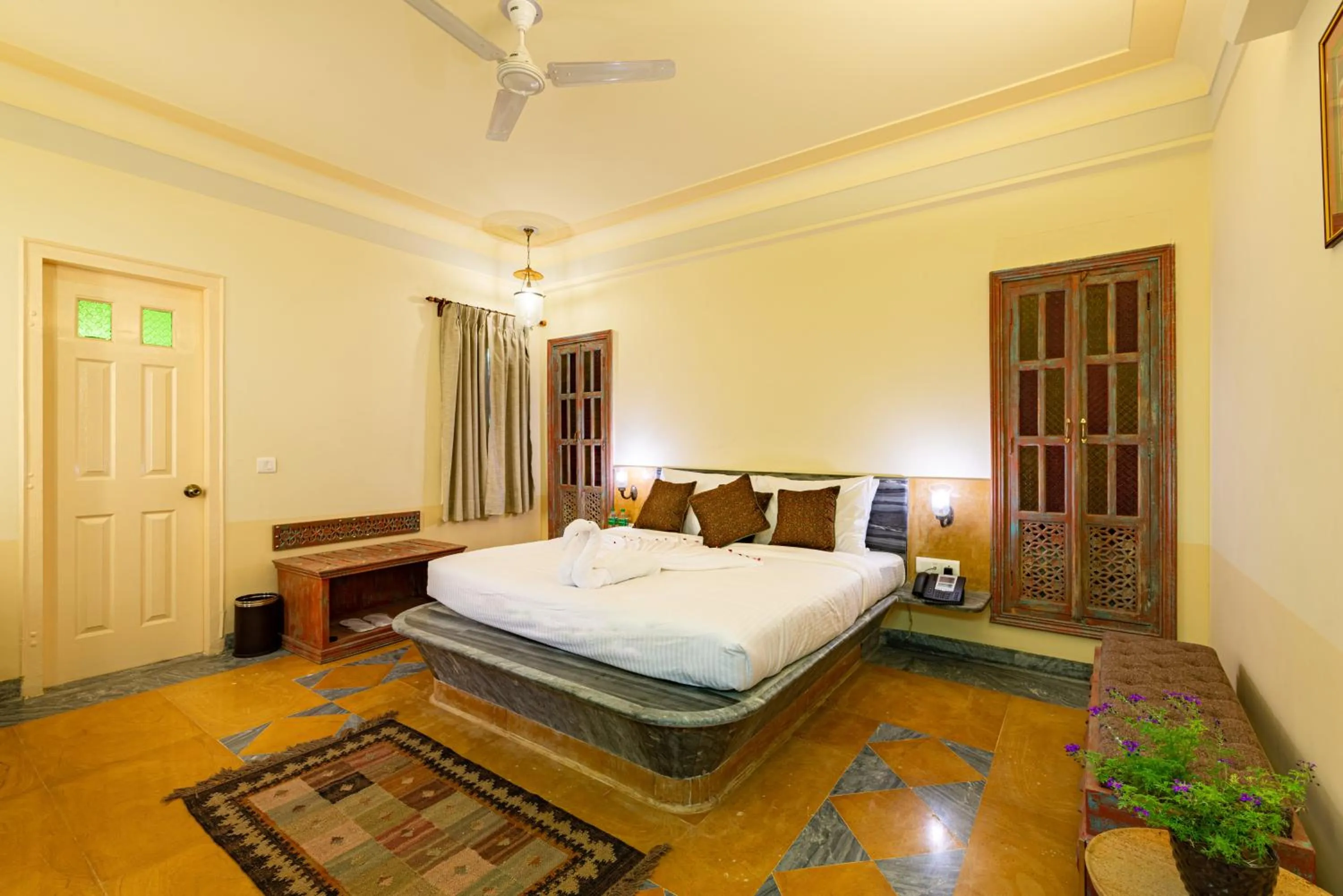 Photo of the whole room, Bed in Anand Bagh Resort & Spa by Ananta