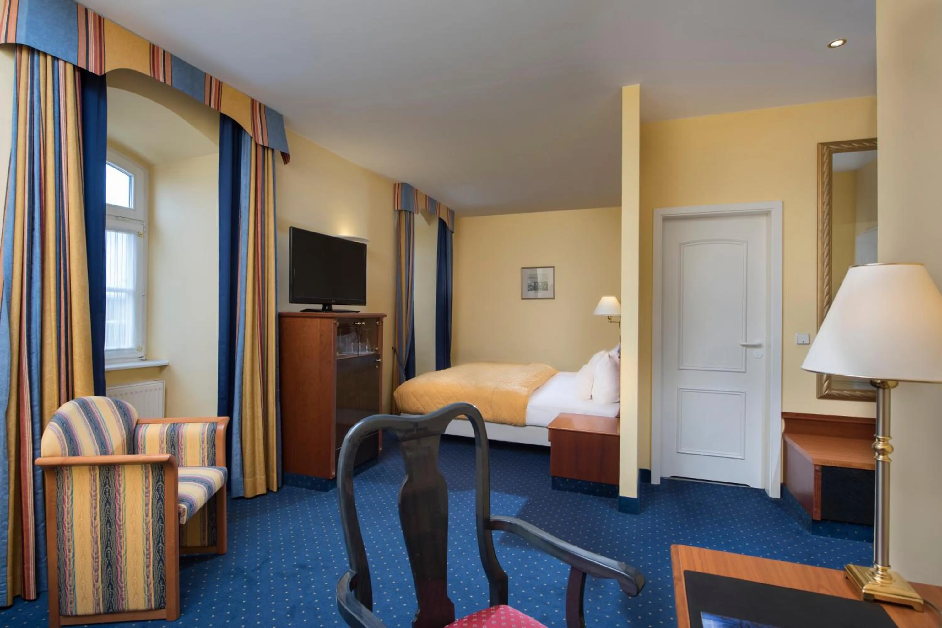 Photo of the whole room, Bed in Radisson Blu Hotel Halle-Merseburg