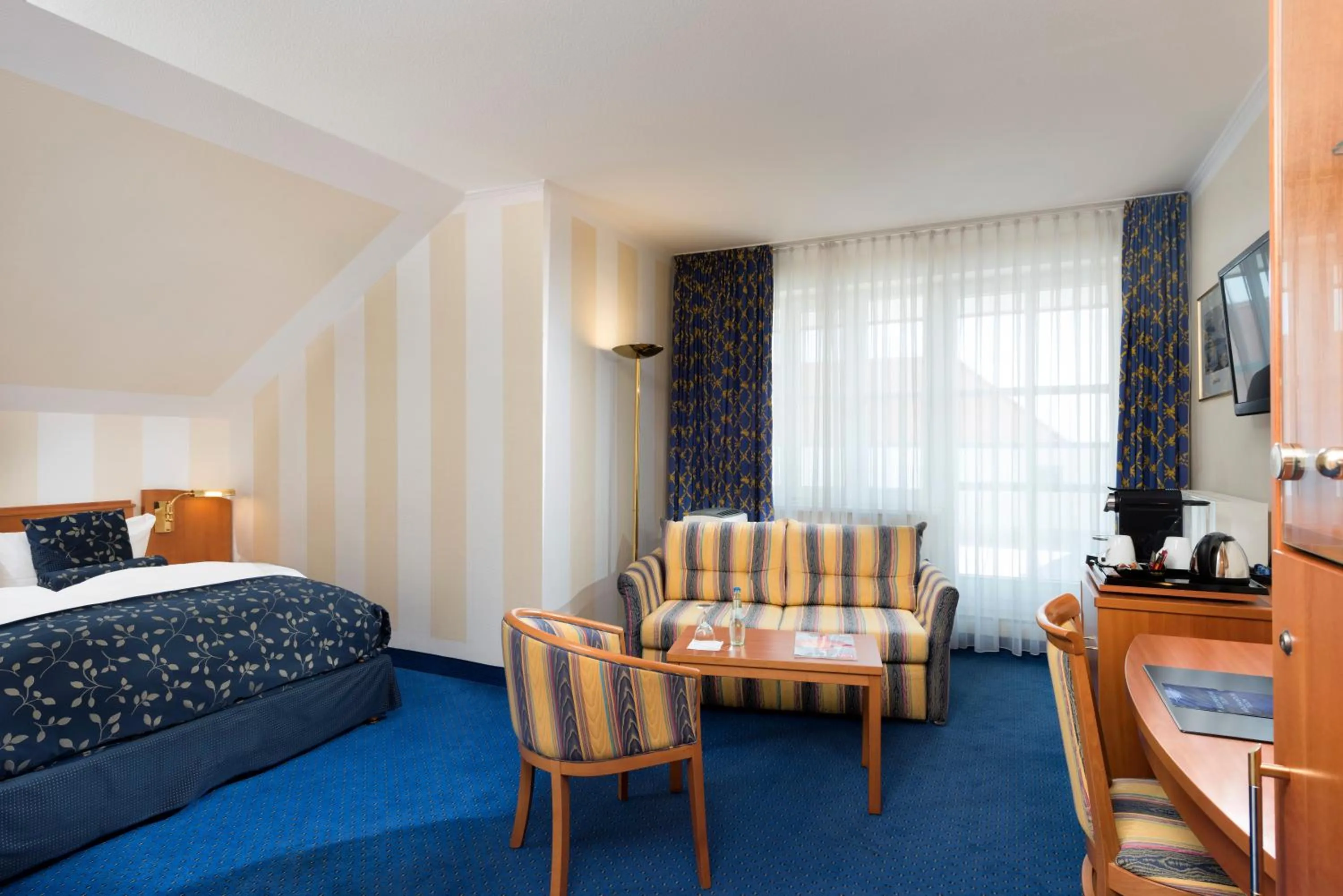 Photo of the whole room, Bed in Radisson Blu Hotel Halle-Merseburg