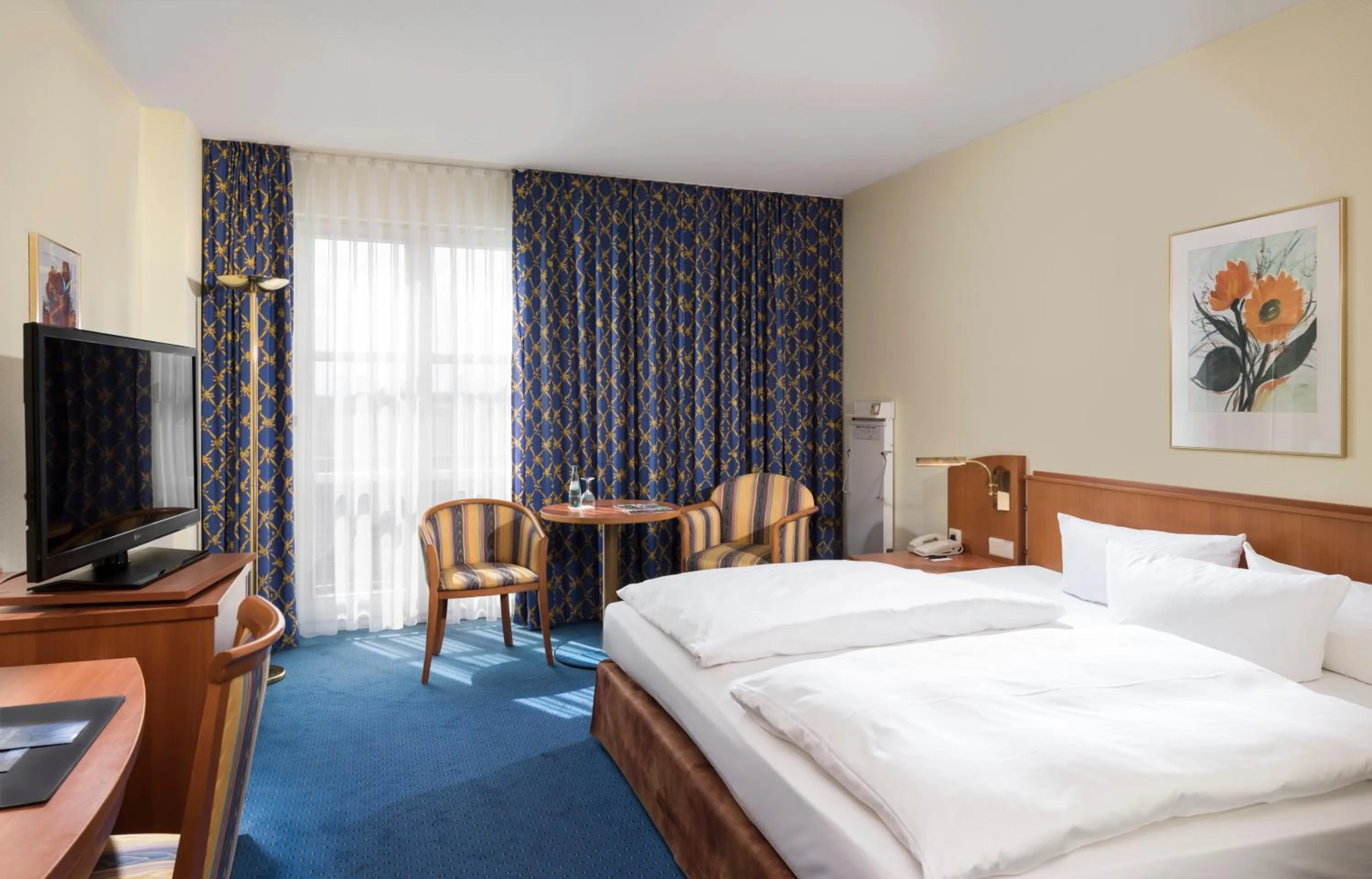 Photo of the whole room, Bed in Radisson Blu Hotel Halle-Merseburg