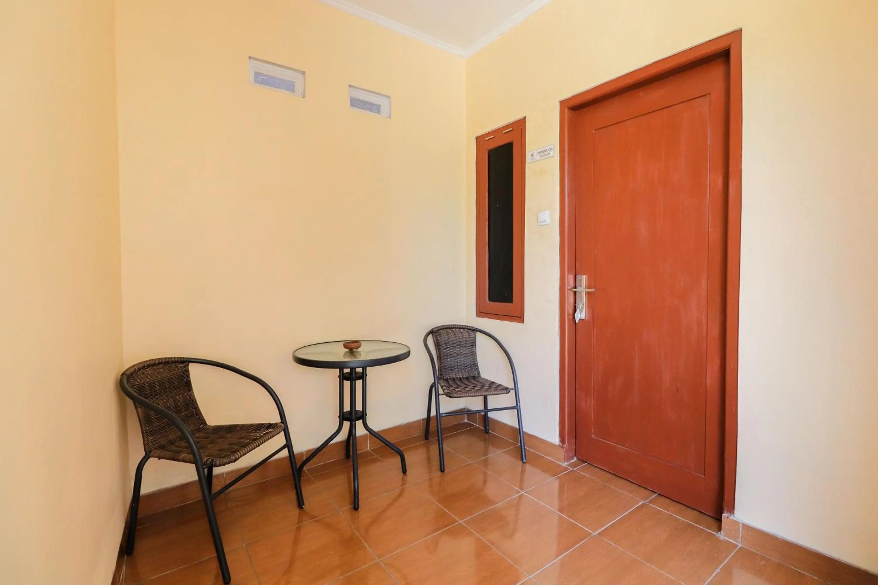 Seating area in Omah Rohadi Syariah by Ndalem Beong