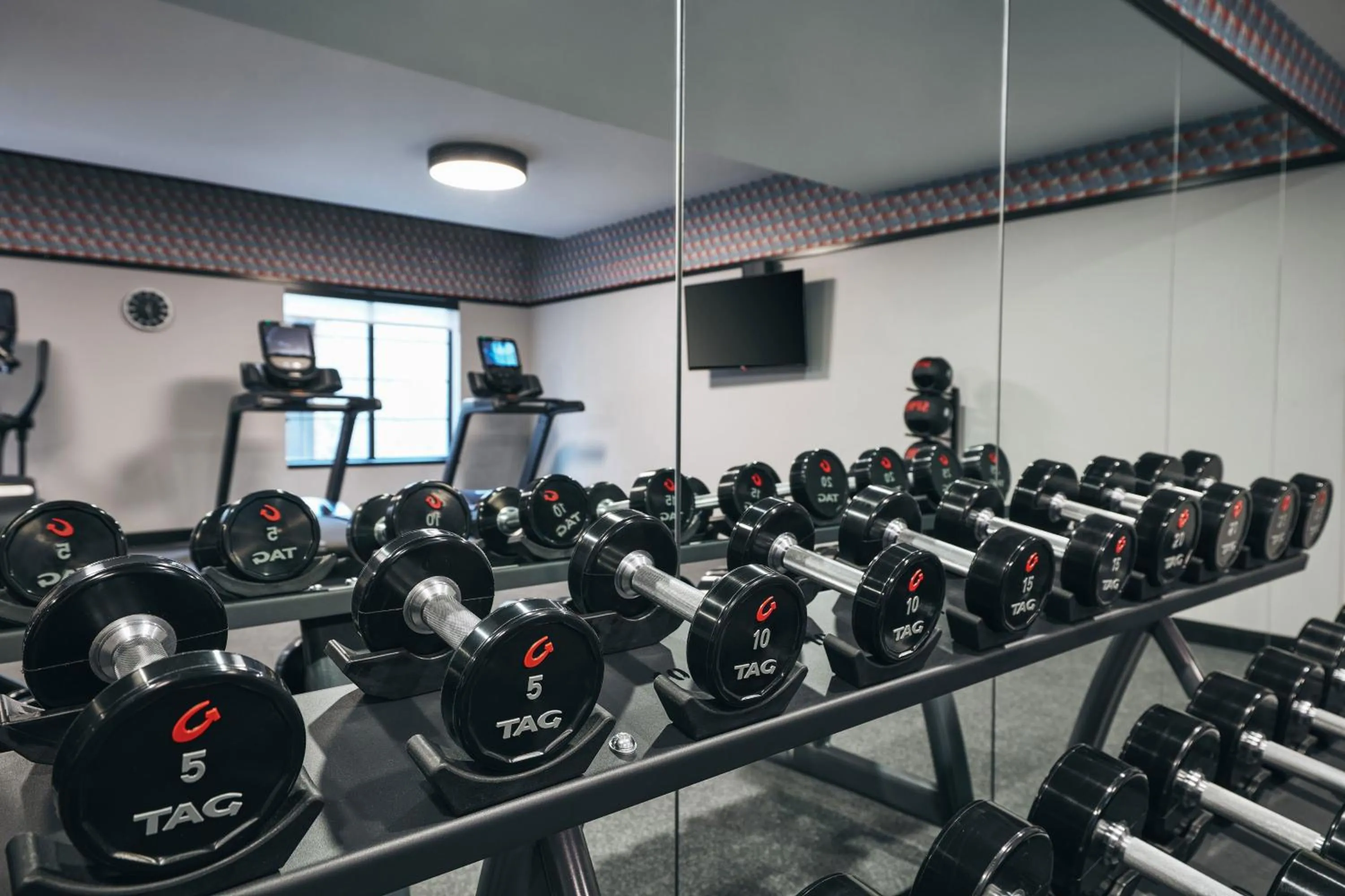 Fitness centre/facilities in Kinley Chattanooga Southside, a Tribute Portfolio Hotel