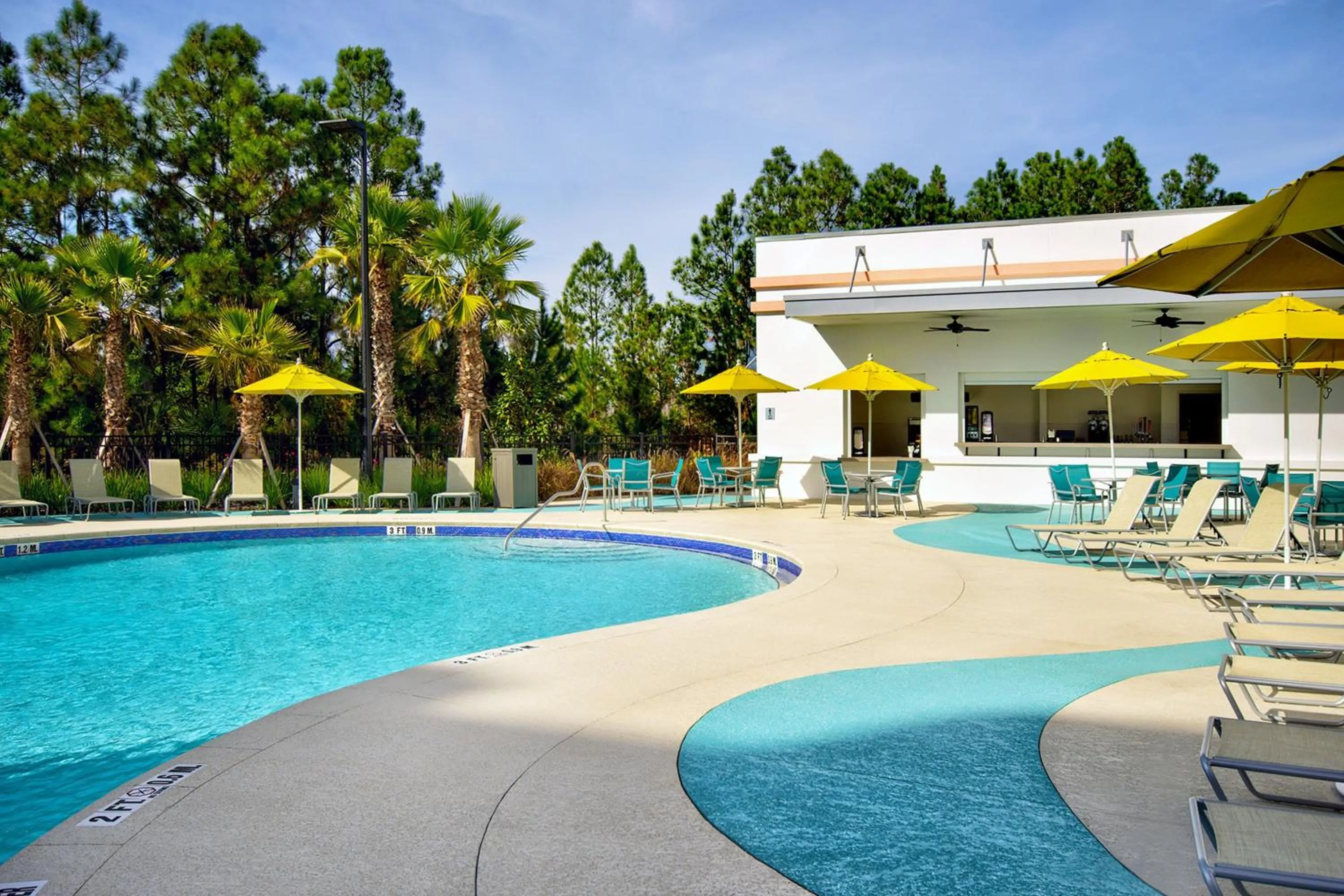 Swimming pool in Fairfield by Marriott Inn & Suites Orlando at FLAMINGO CROSSINGS® Town Center