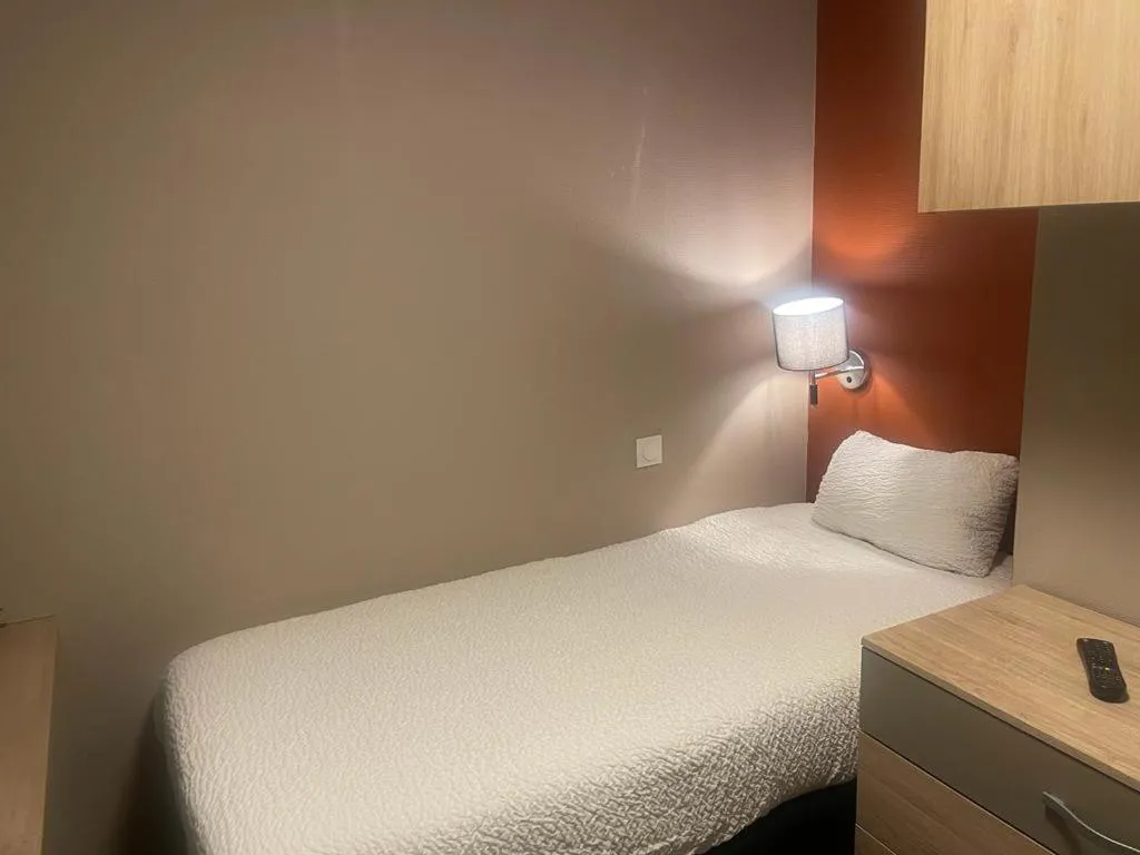 Bed in Appart'hôtel Voltaire