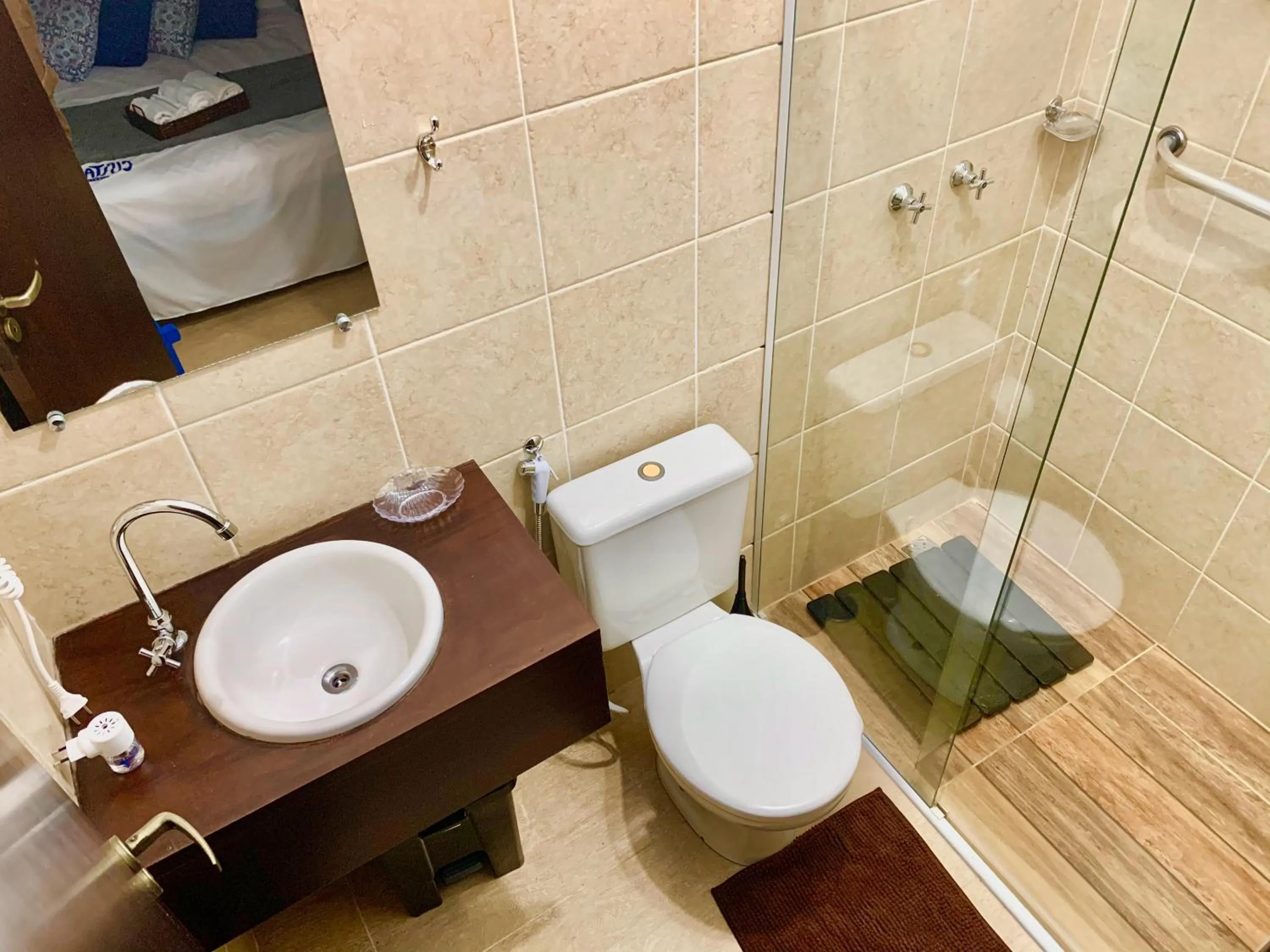 Bathroom in Suítes Curta Paraty, Família e PETs