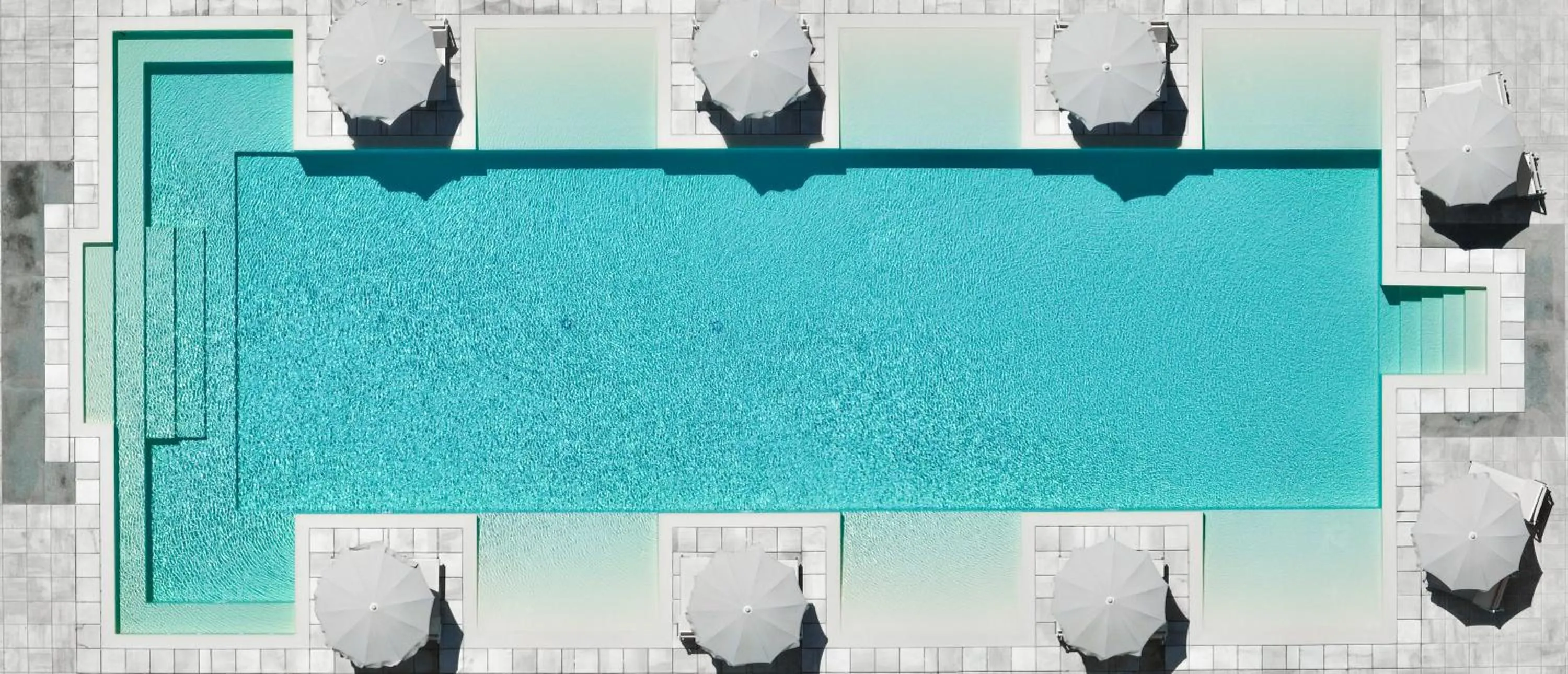 Swimming pool in Capo Falcone Charming Apartments