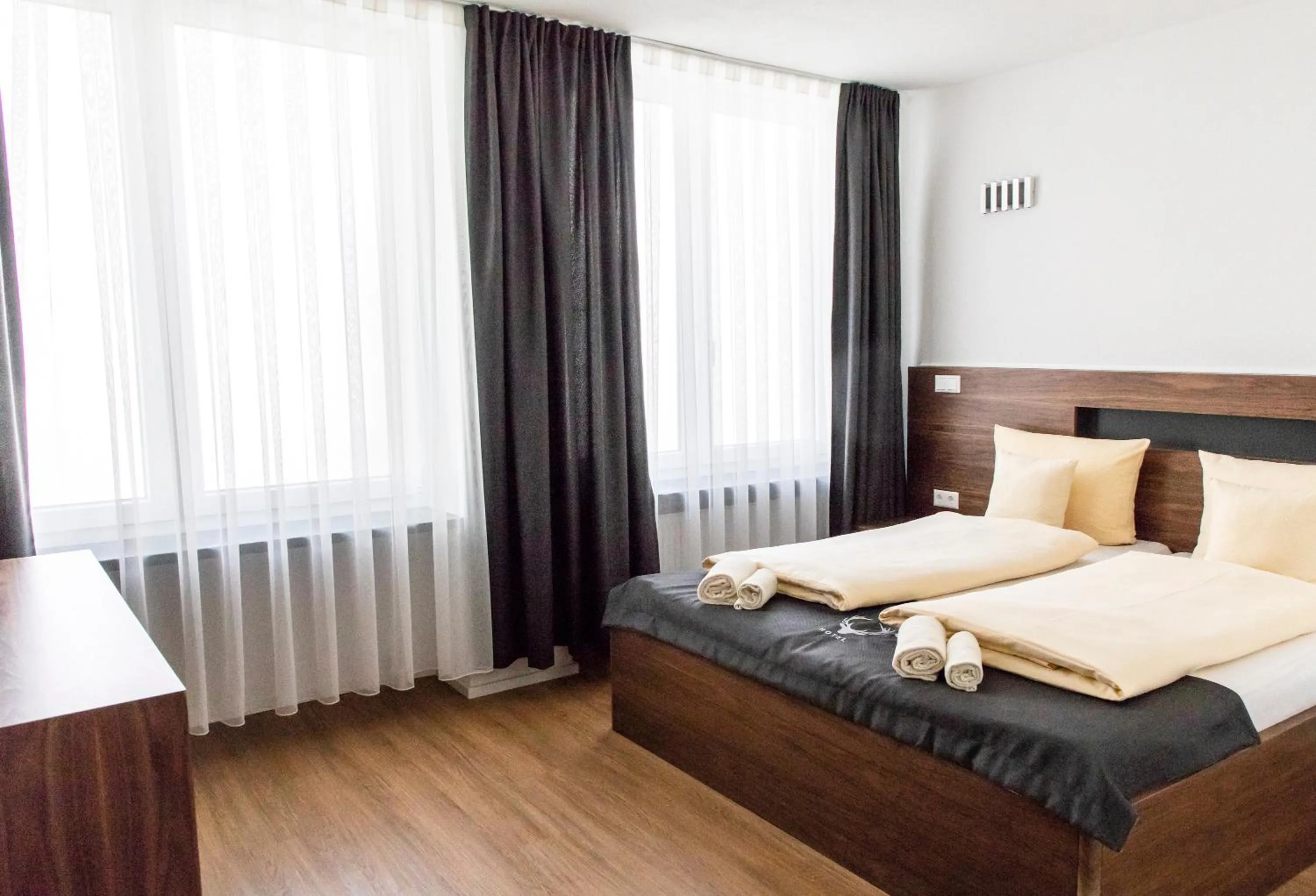 Photo of the whole room, Bed in Hotel JÄGERHAUS in Singen am Hohentwiel