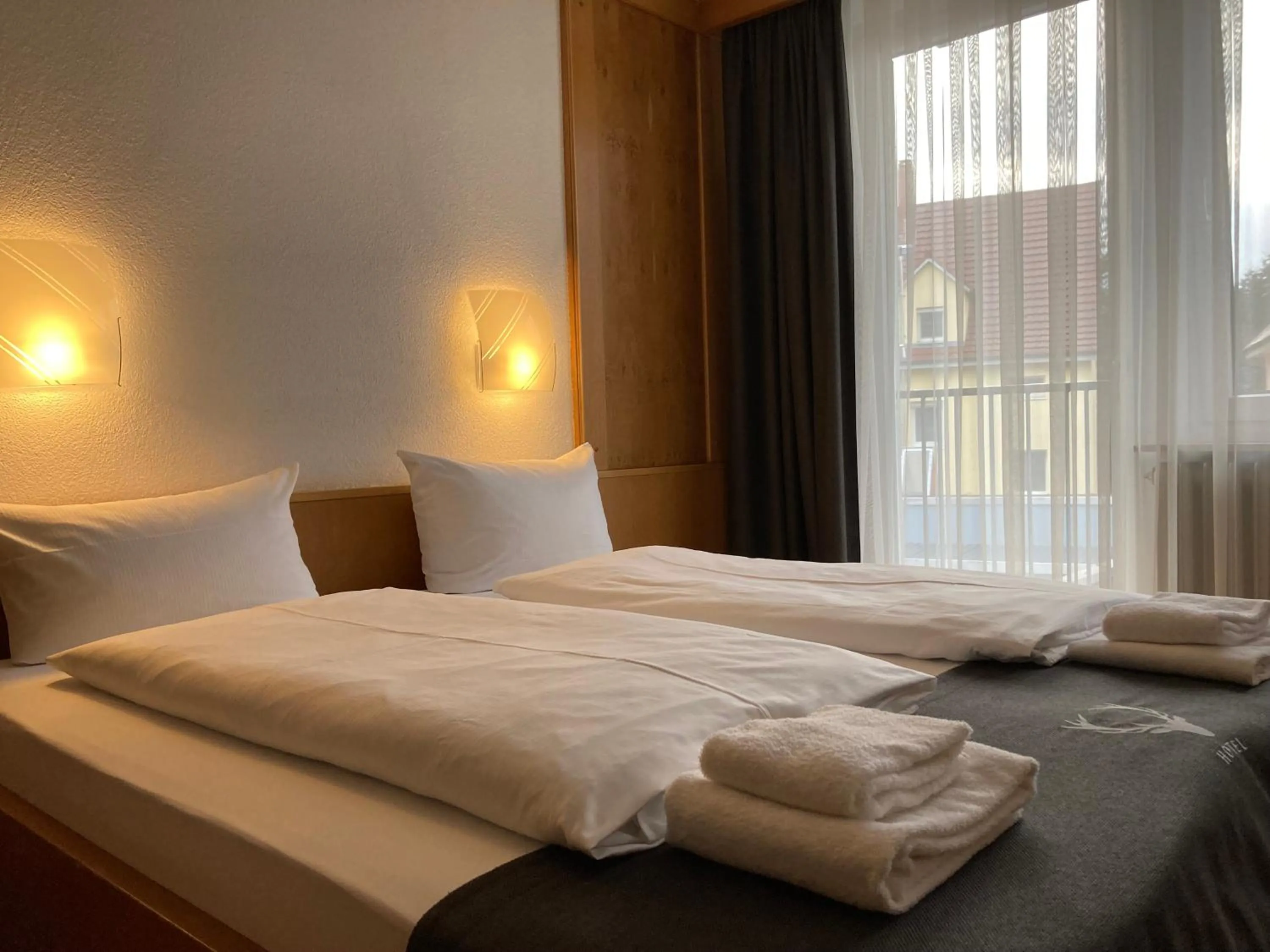 Photo of the whole room, Bed in Hotel JÄGERHAUS in Singen am Hohentwiel