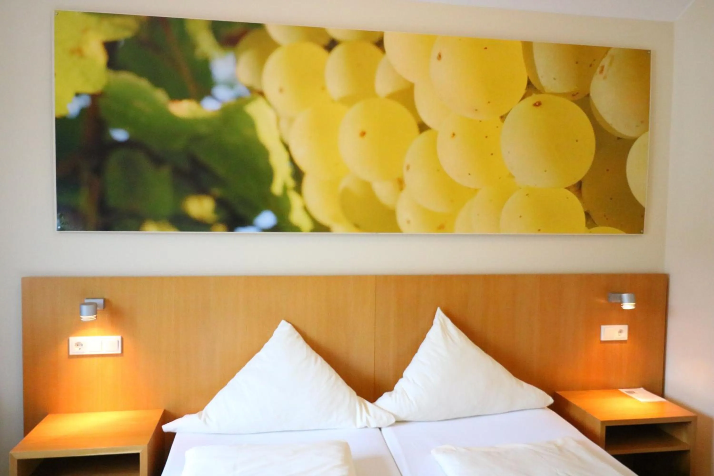 Decorative detail, Bed in Christiana's Wein & Art Hotel