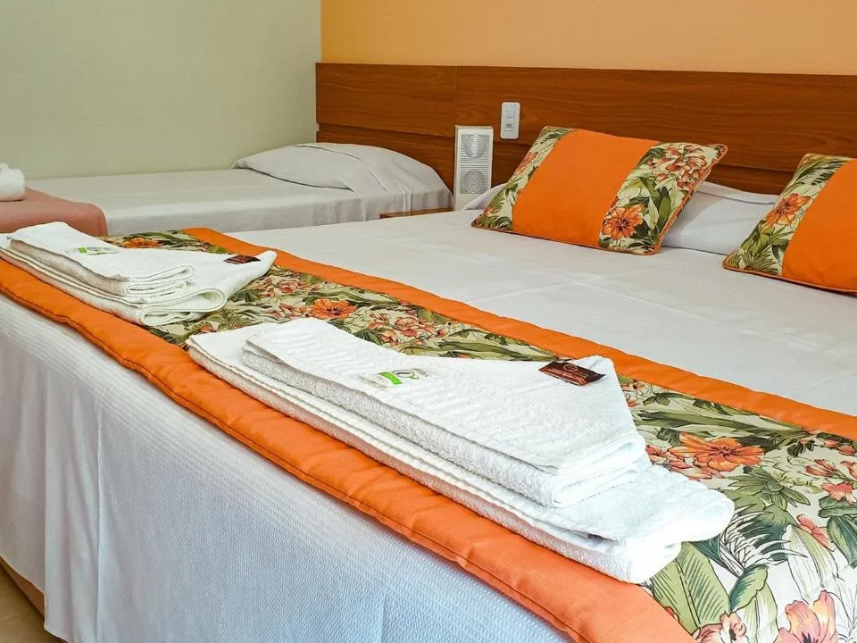 Bed in Pousada Cantinho da Praia