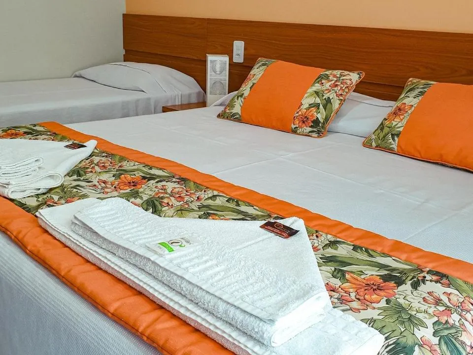 Bed in Pousada Cantinho da Praia