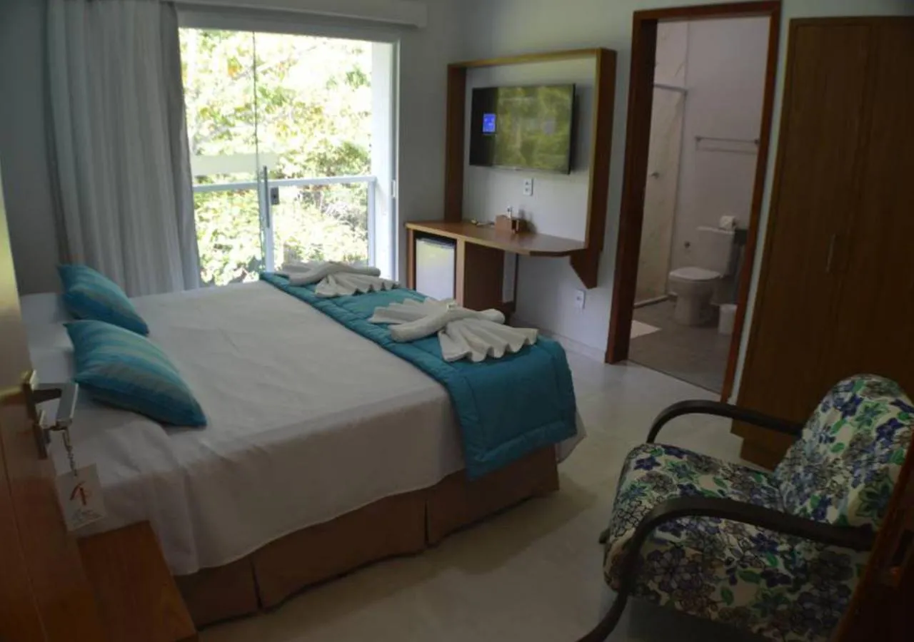 Photo of the whole room, Bed in Pousada Cantinho da Praia