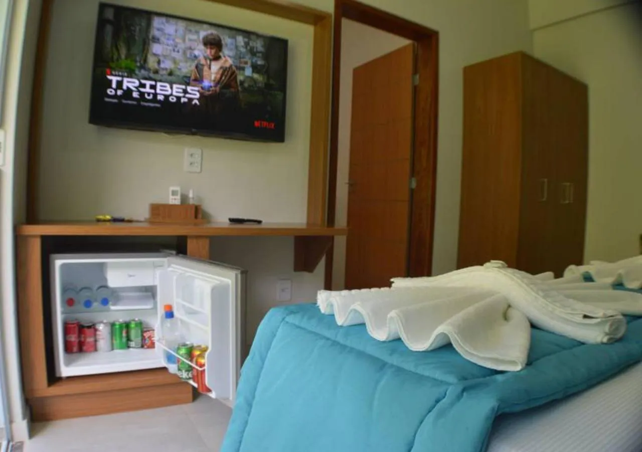 Communal lounge/ TV room, Bed in Pousada Cantinho da Praia