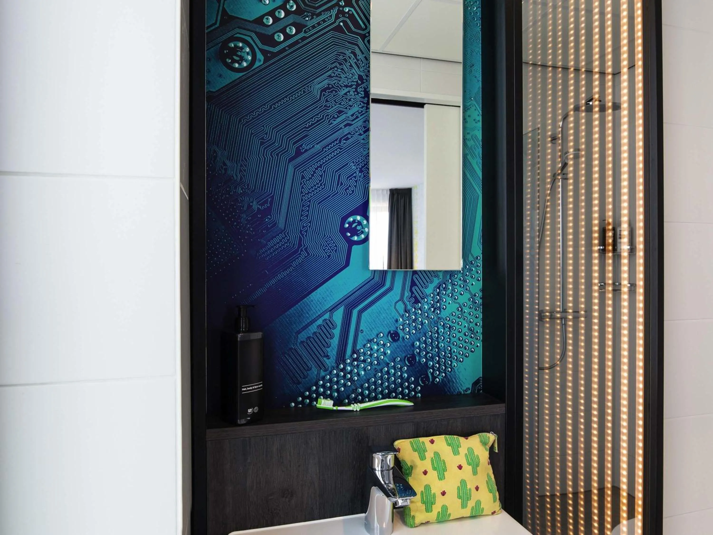 Bedroom in ibis Styles Delft City Centre