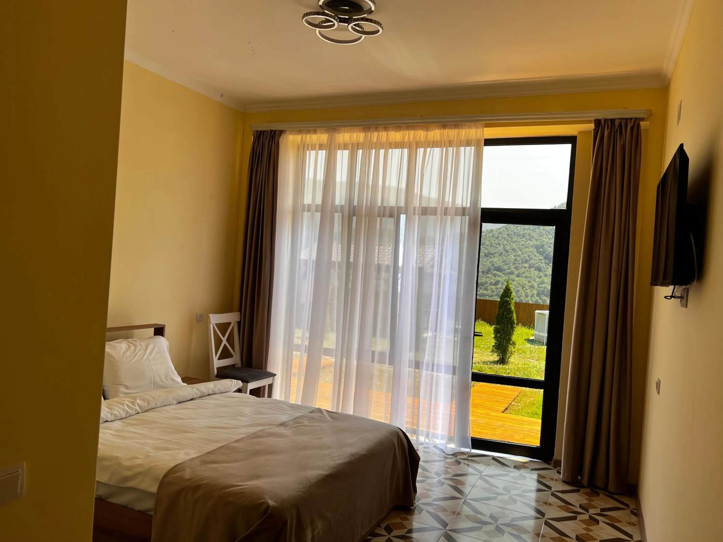 Bed in COTTAGE CHALET and TOURS