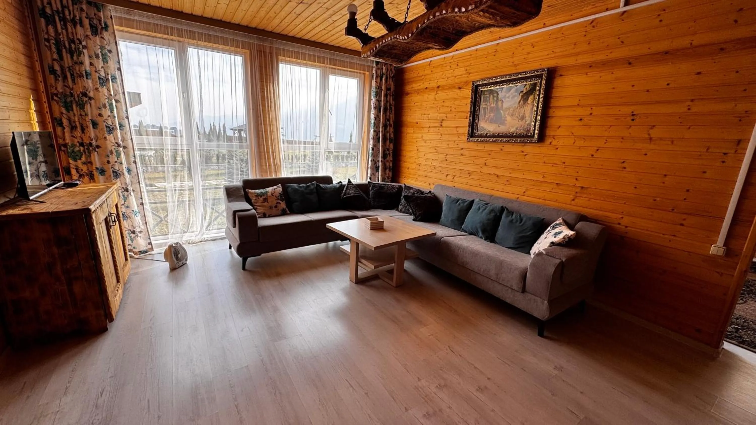 Living room in COTTAGE CHALET and TOURS