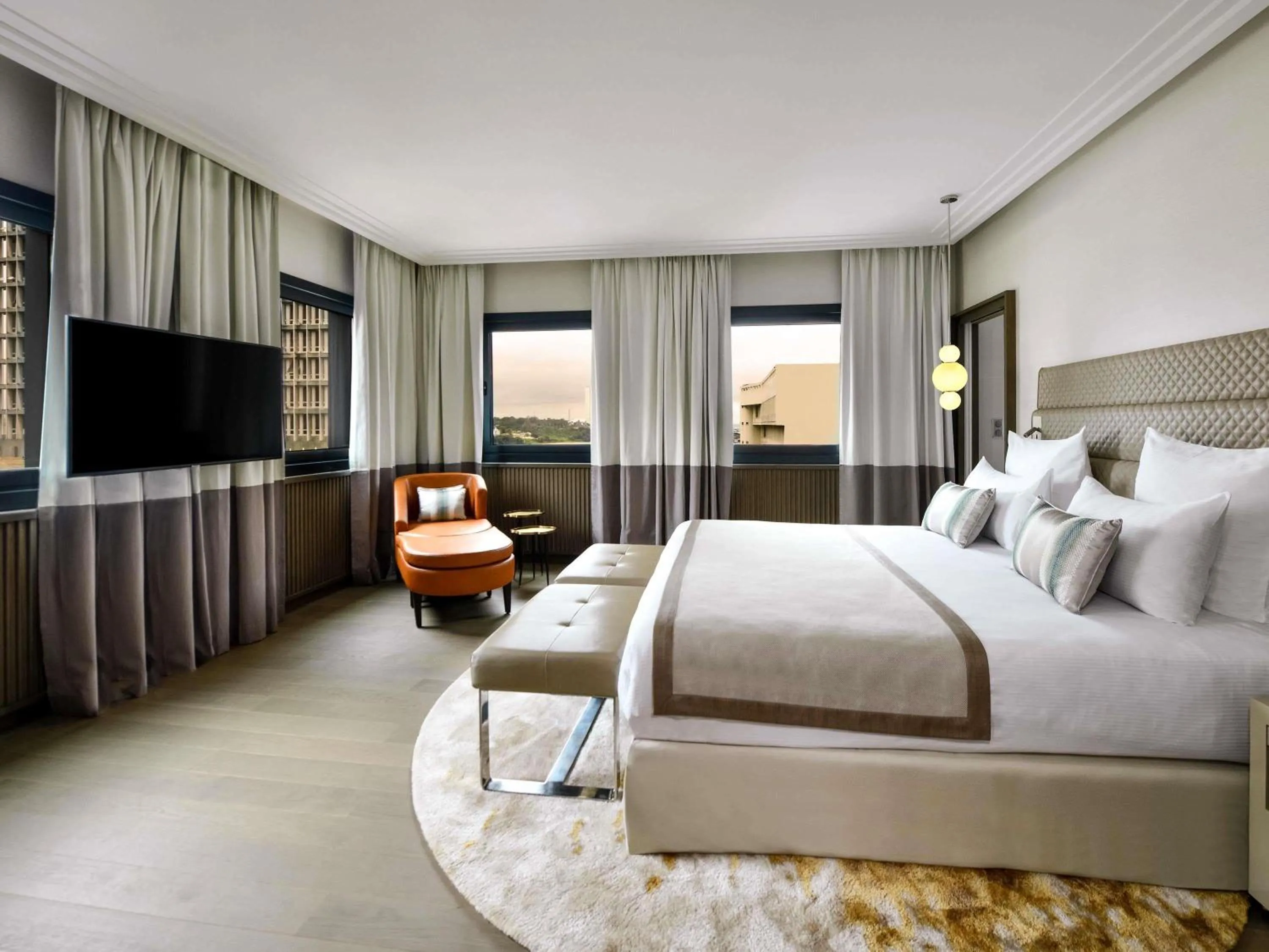 Photo of the whole room, Bed in Movenpick Hotel Abidjan-Accor Group