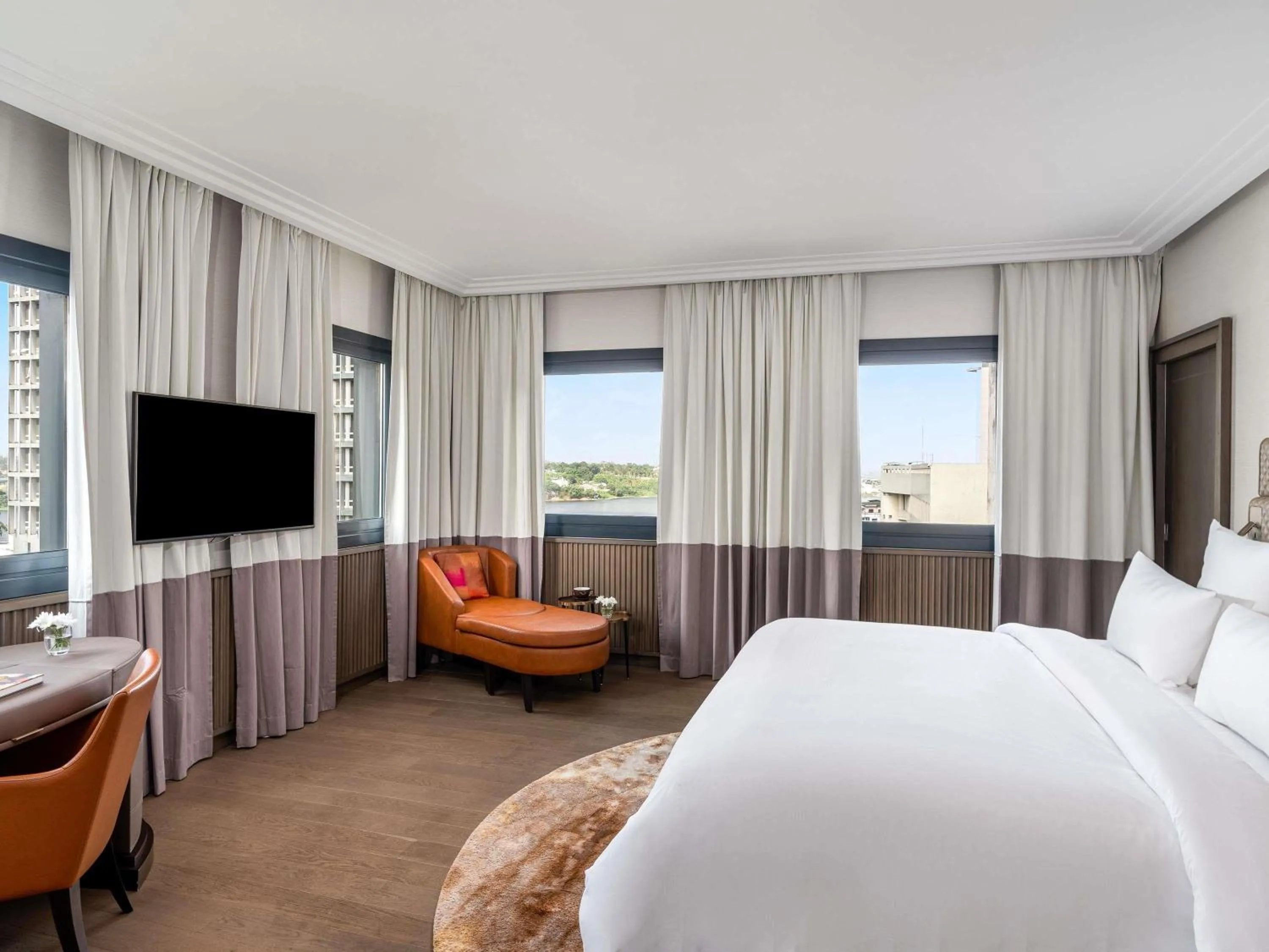 Photo of the whole room, Bed in Movenpick Hotel Abidjan-Accor Group