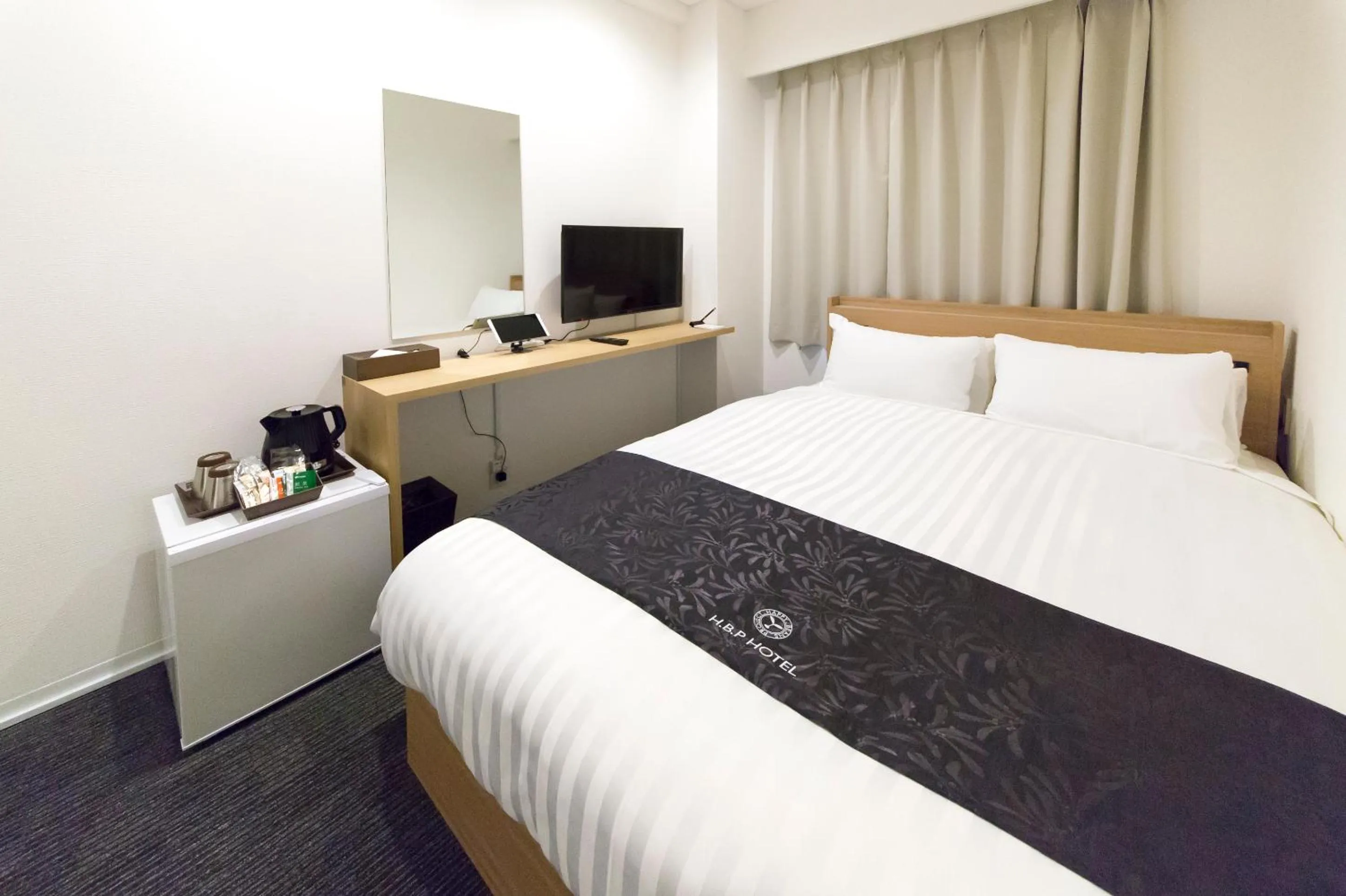 Photo of the whole room, Bed in H.B.P HOTEL