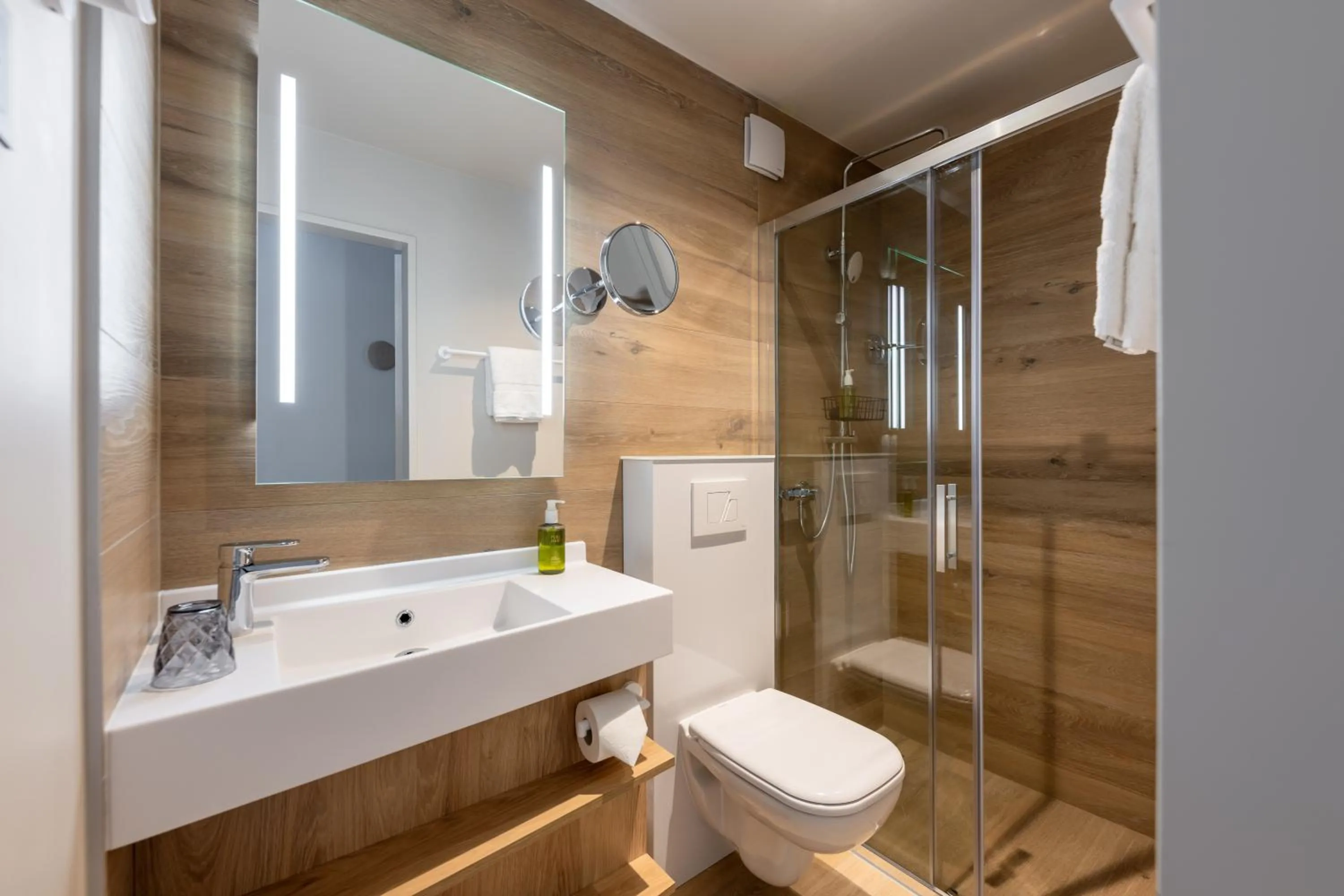 Bathroom in Hotel Schweizerhof Sils Maria, a Faern Collection Hotel