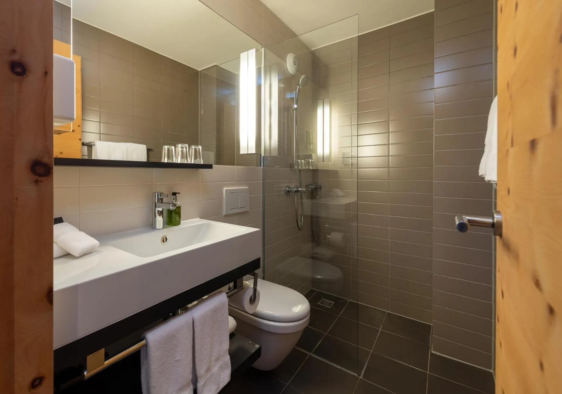 Shower in Hotel Schweizerhof Sils Maria, a Faern Collection Hotel