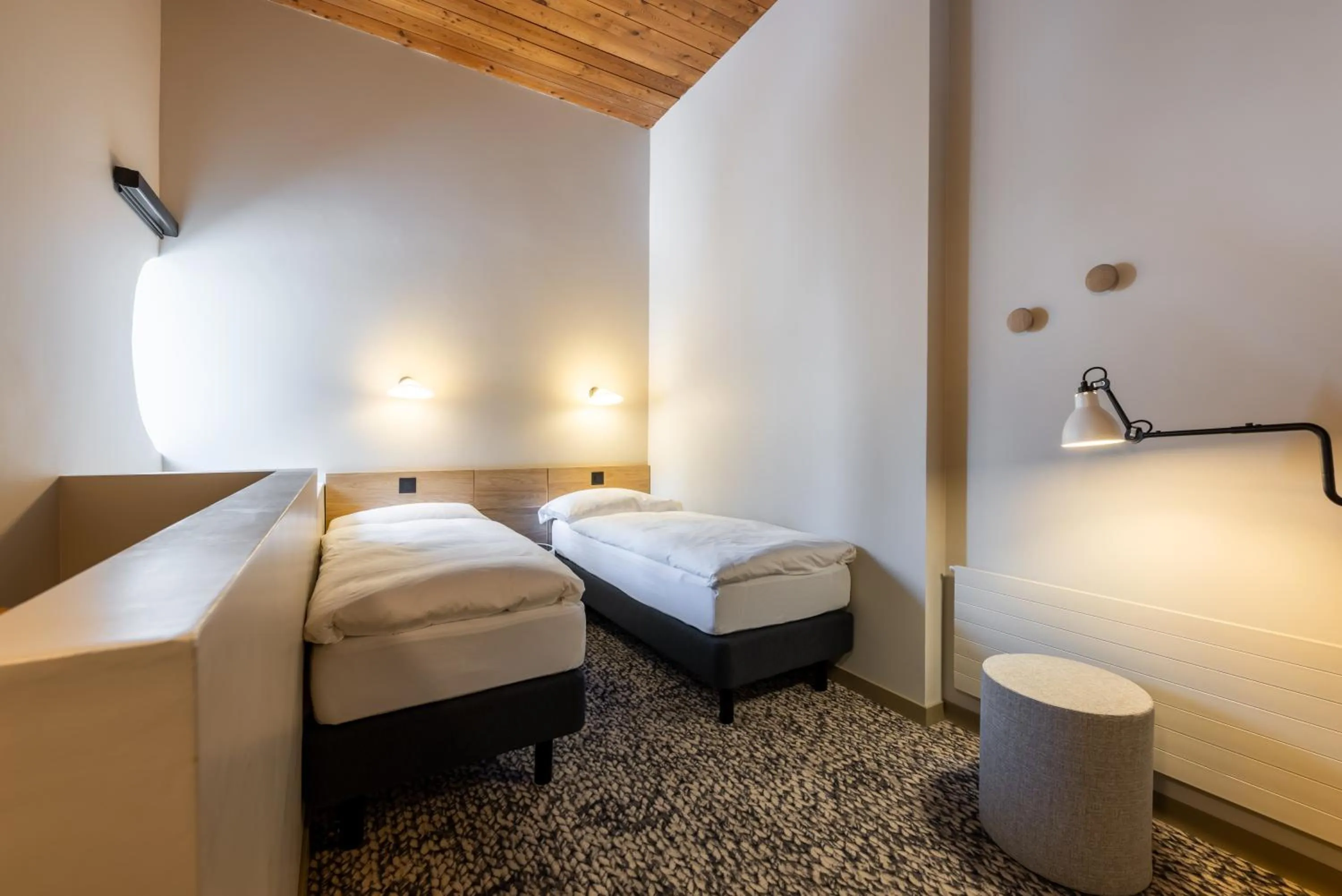 Bedroom, Bed in Hotel Schweizerhof Sils Maria, a Faern Collection Hotel