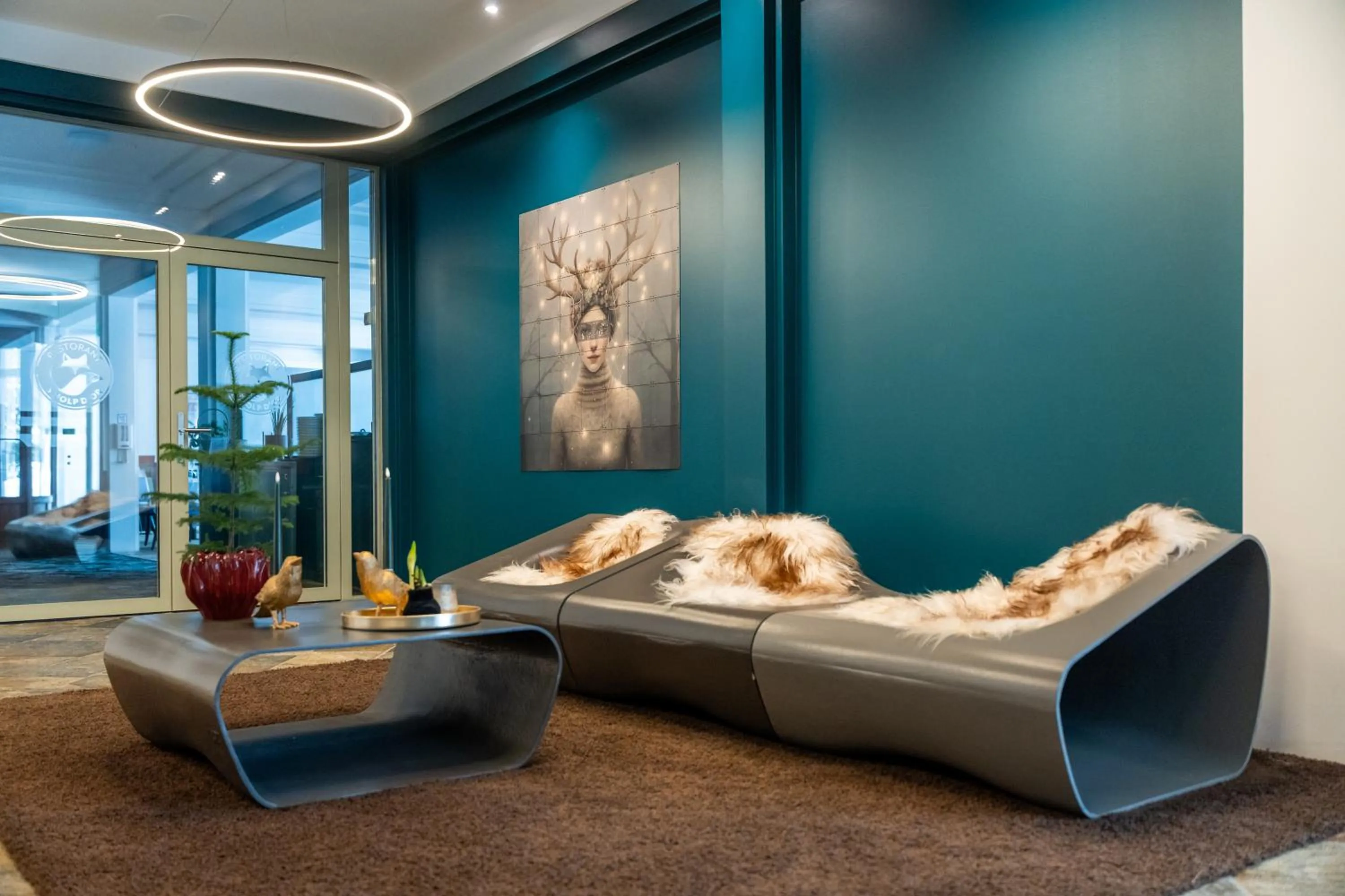 Lobby or reception in Hotel Schweizerhof Sils Maria, a Faern Collection Hotel