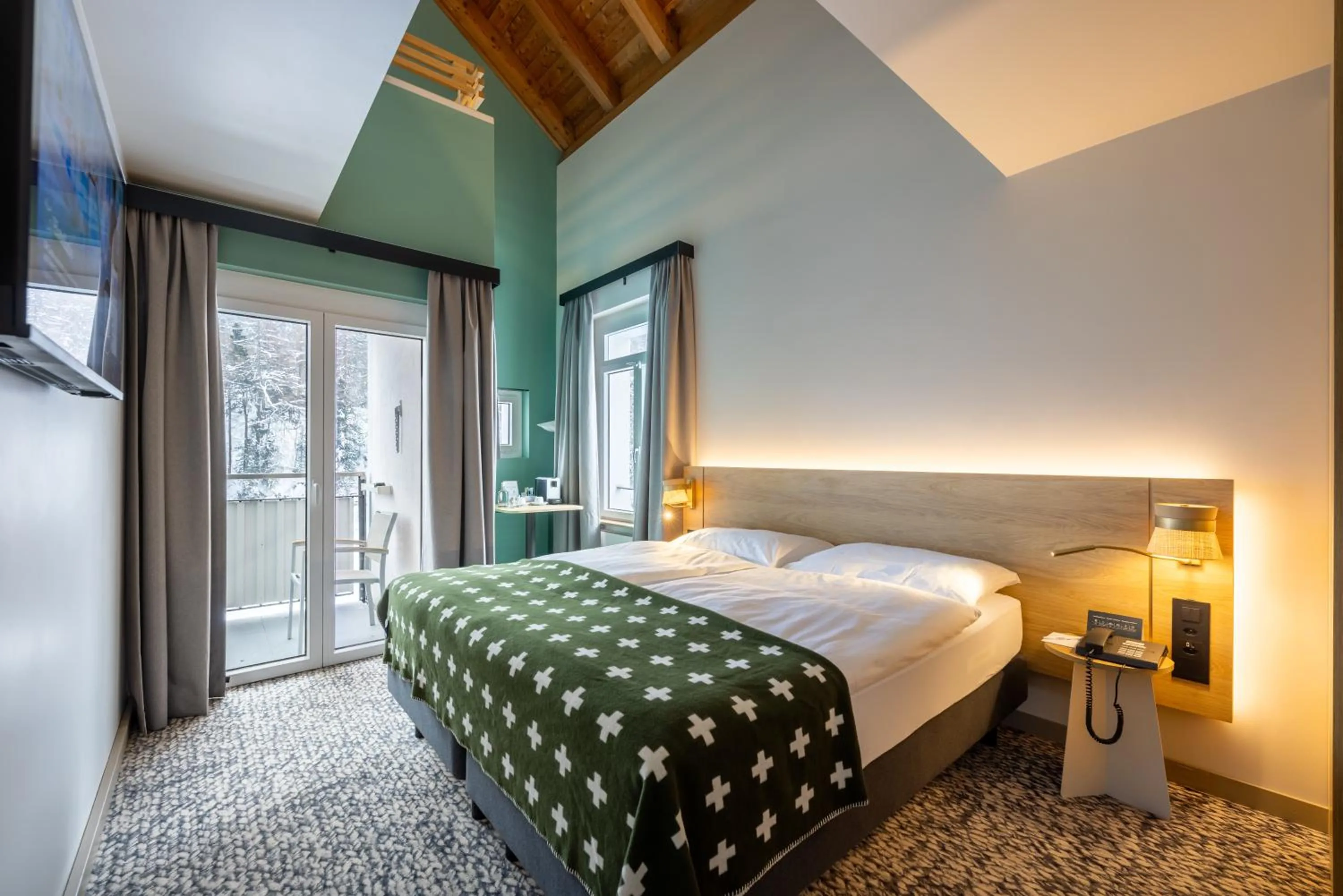 Bedroom, Bed in Hotel Schweizerhof Sils Maria, a Faern Collection Hotel