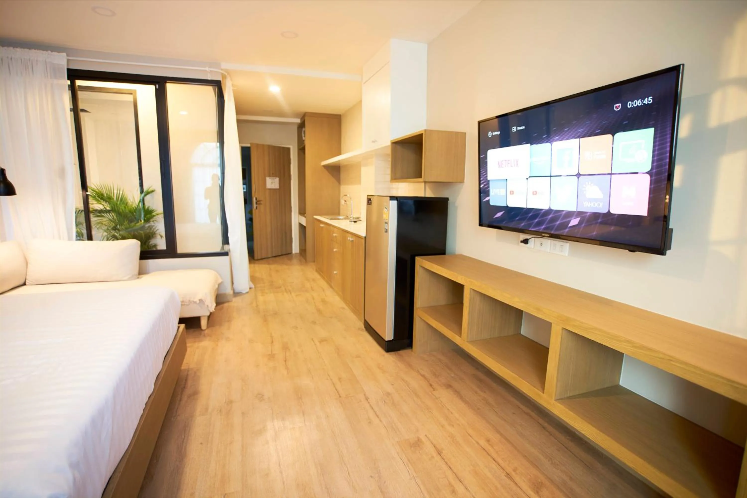 Communal lounge/ TV room, Bed in Dream Nimman Apartment