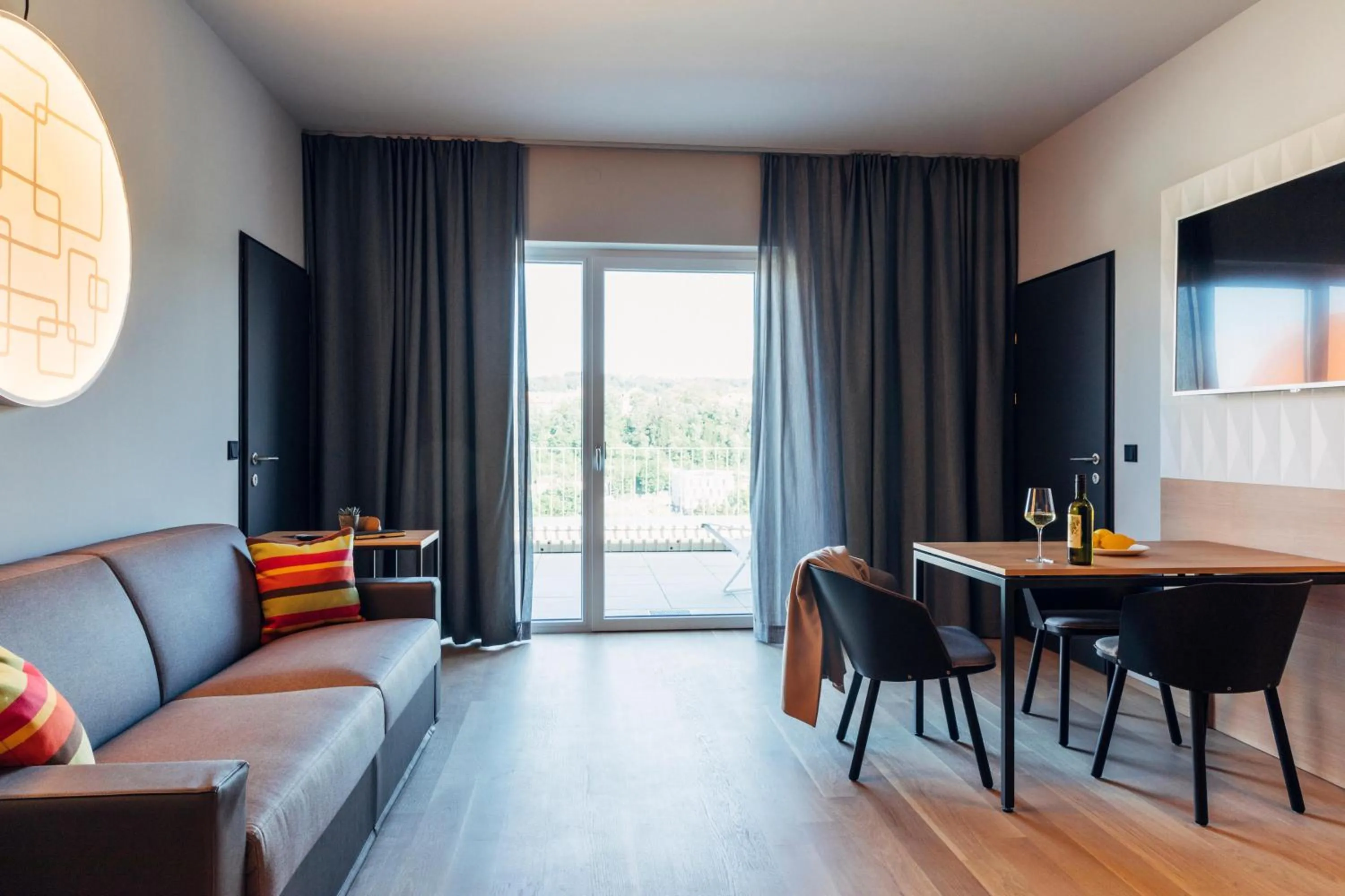 Photo of the whole room in harry's home Steyr hotel & apartments