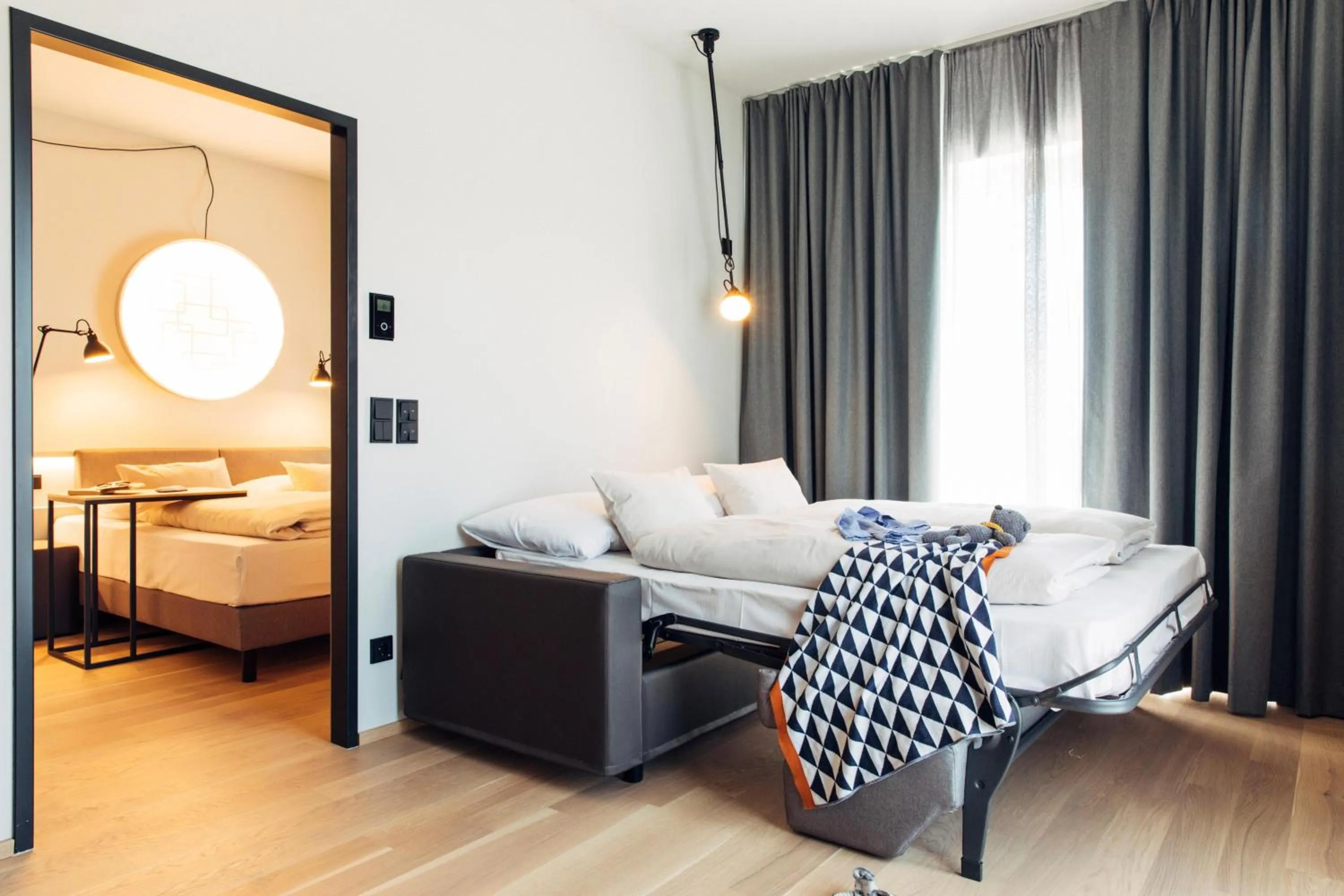 Photo of the whole room, Bed in harry's home Steyr hotel & apartments