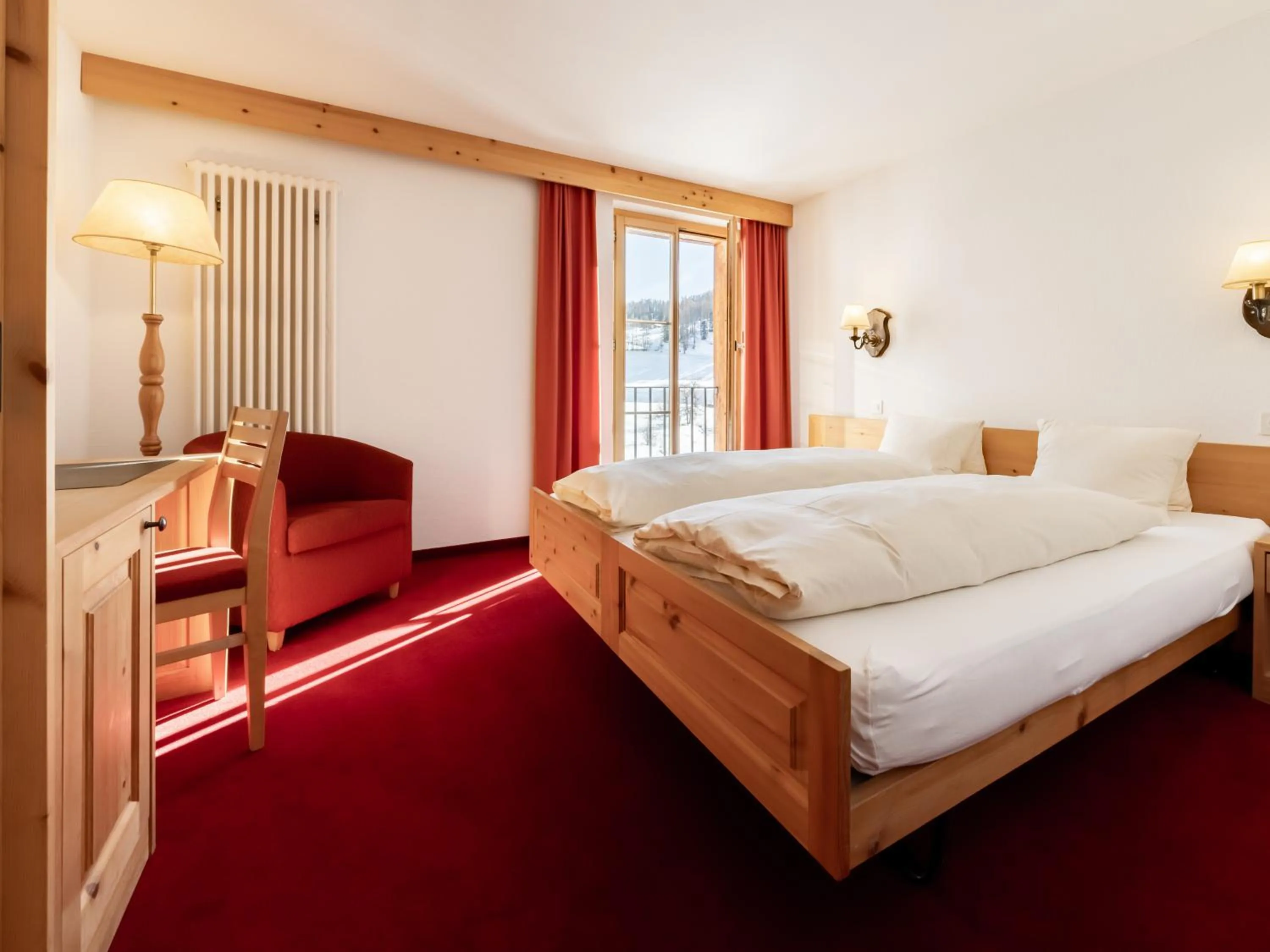 Bedroom, Bed in Hotel Chesa Pool