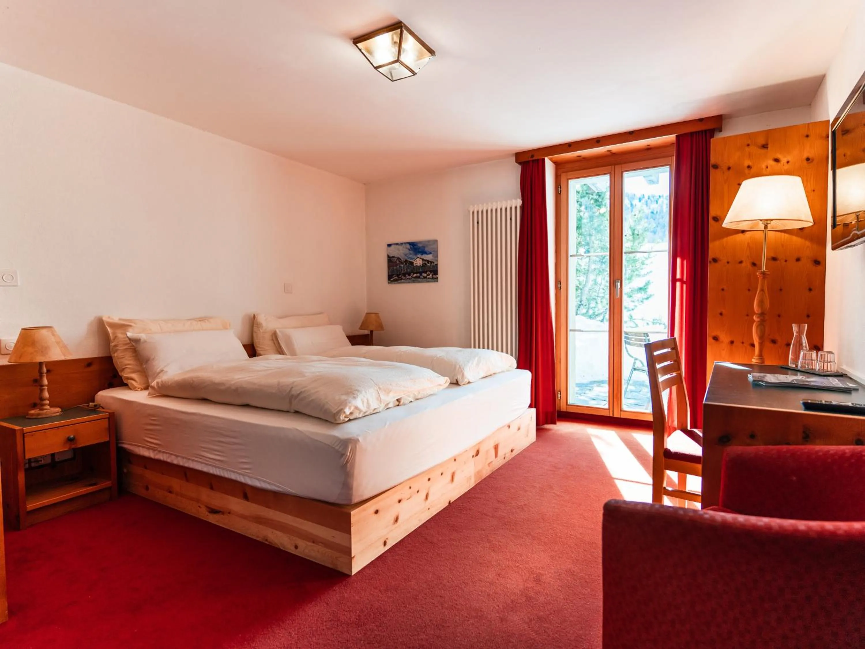 Bedroom, Bed in Hotel Chesa Pool