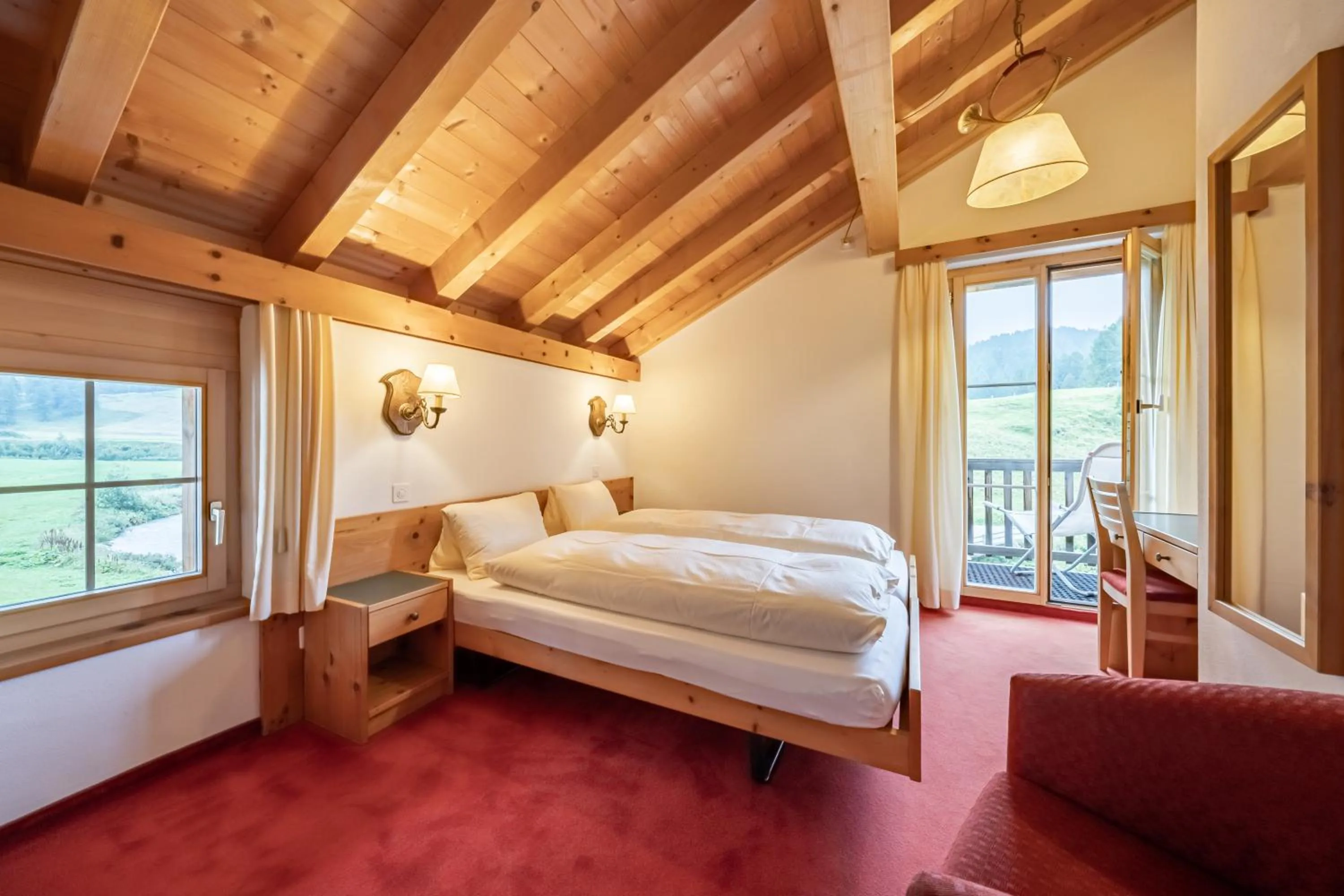 Bedroom, Bed in Hotel Chesa Pool