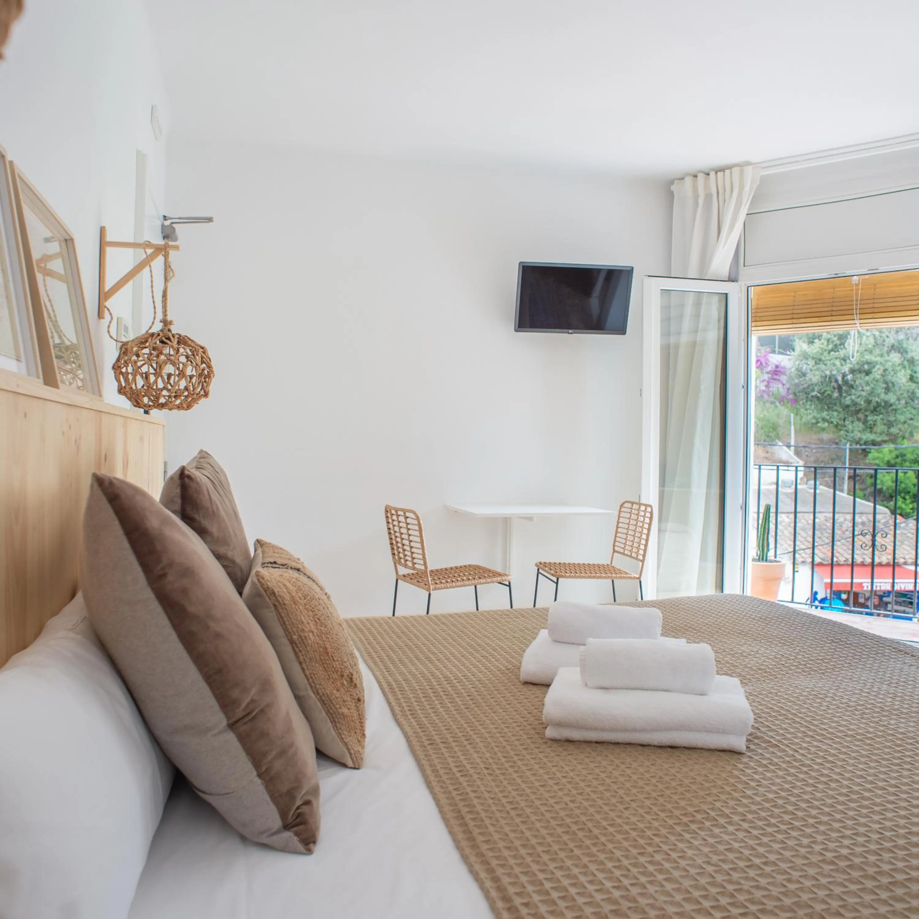 Seating area, Bed in Hostal Sa Teula