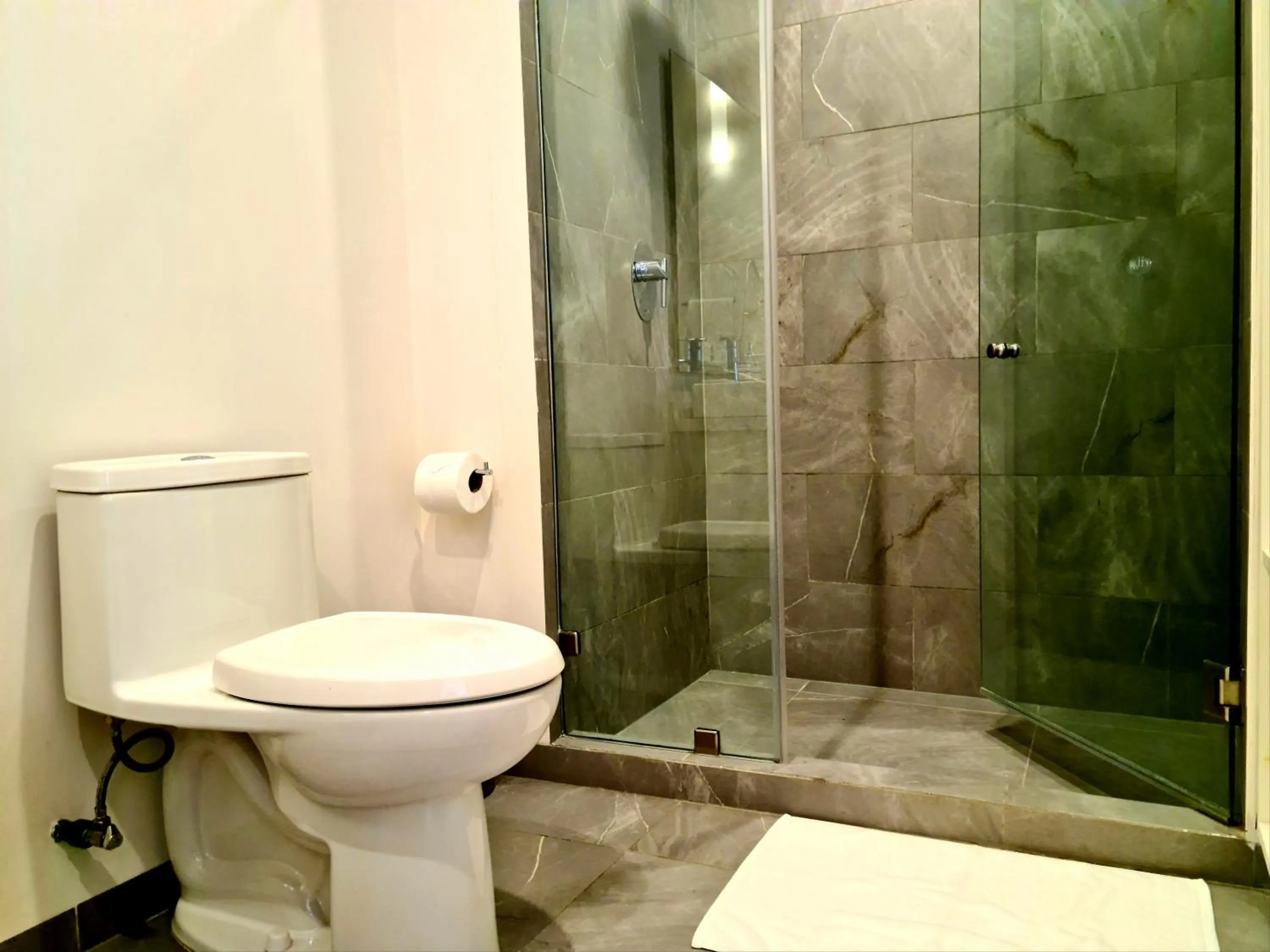 Bathroom in The Gallery Condos Discover Playa del Carmen from The Gallery Condos steps to the beach