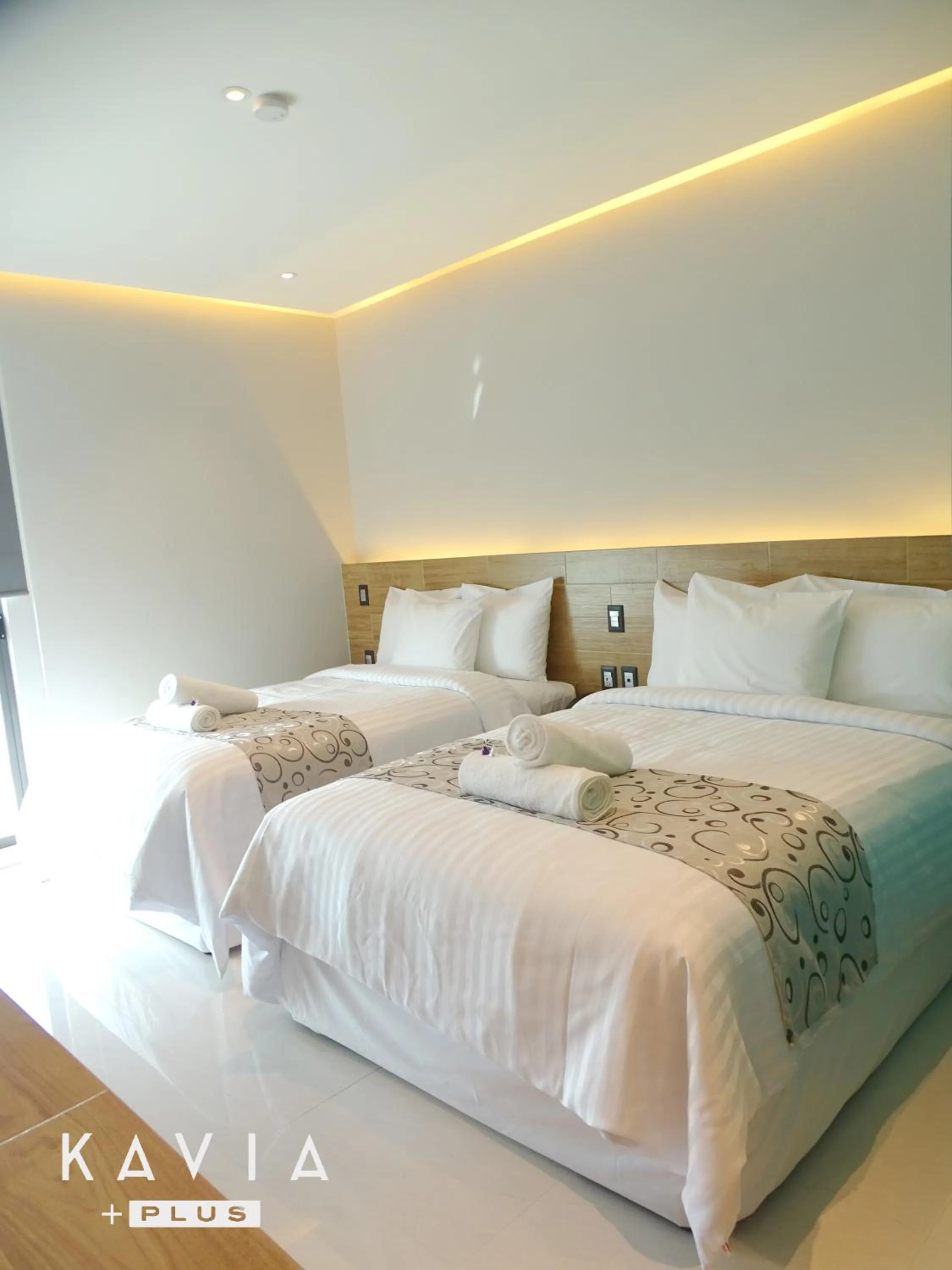 Bed in Hotel Kavia Plus