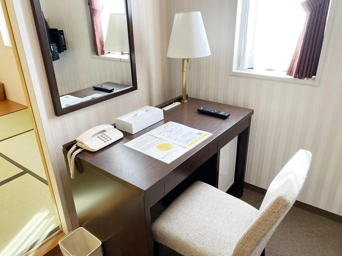 Bed in Smile Hotel Kitaasaka