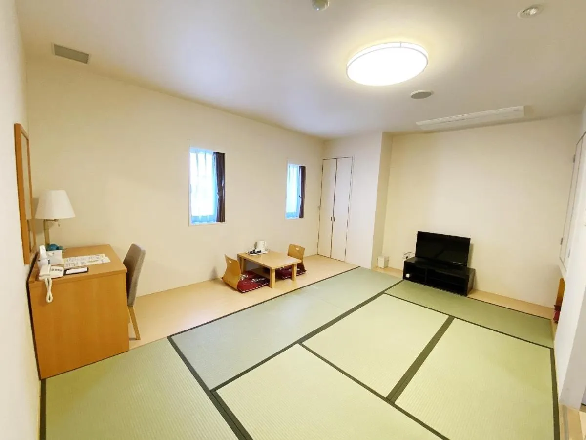 Bed in Smile Hotel Kitaasaka