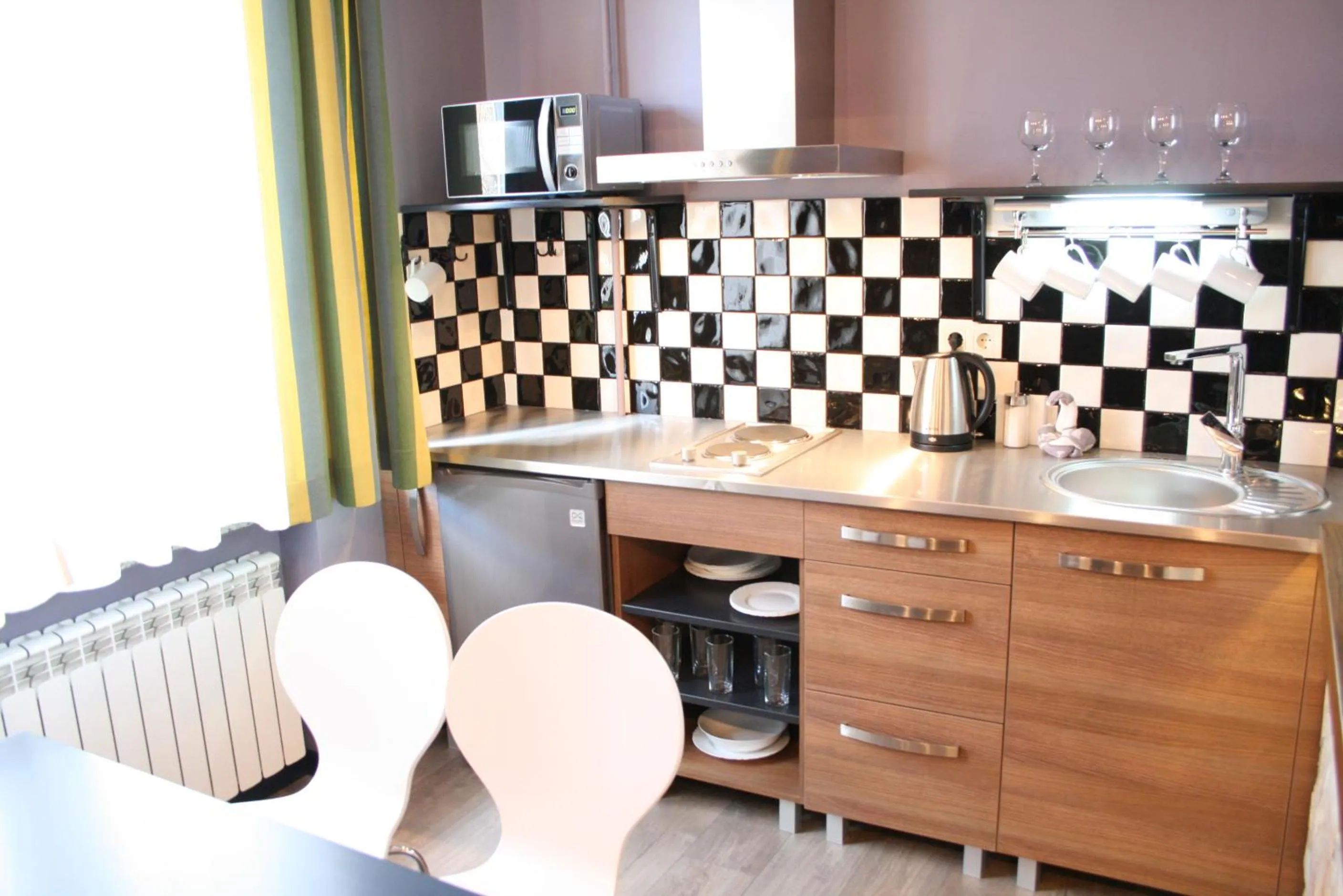 Kitchen or kitchenette in Aparthotel