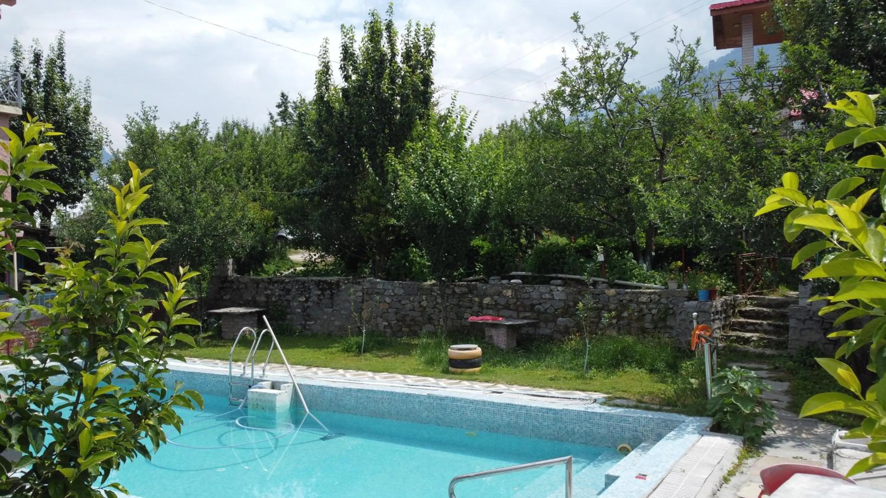 Swimming pool in Countryside Himalayan Resort
