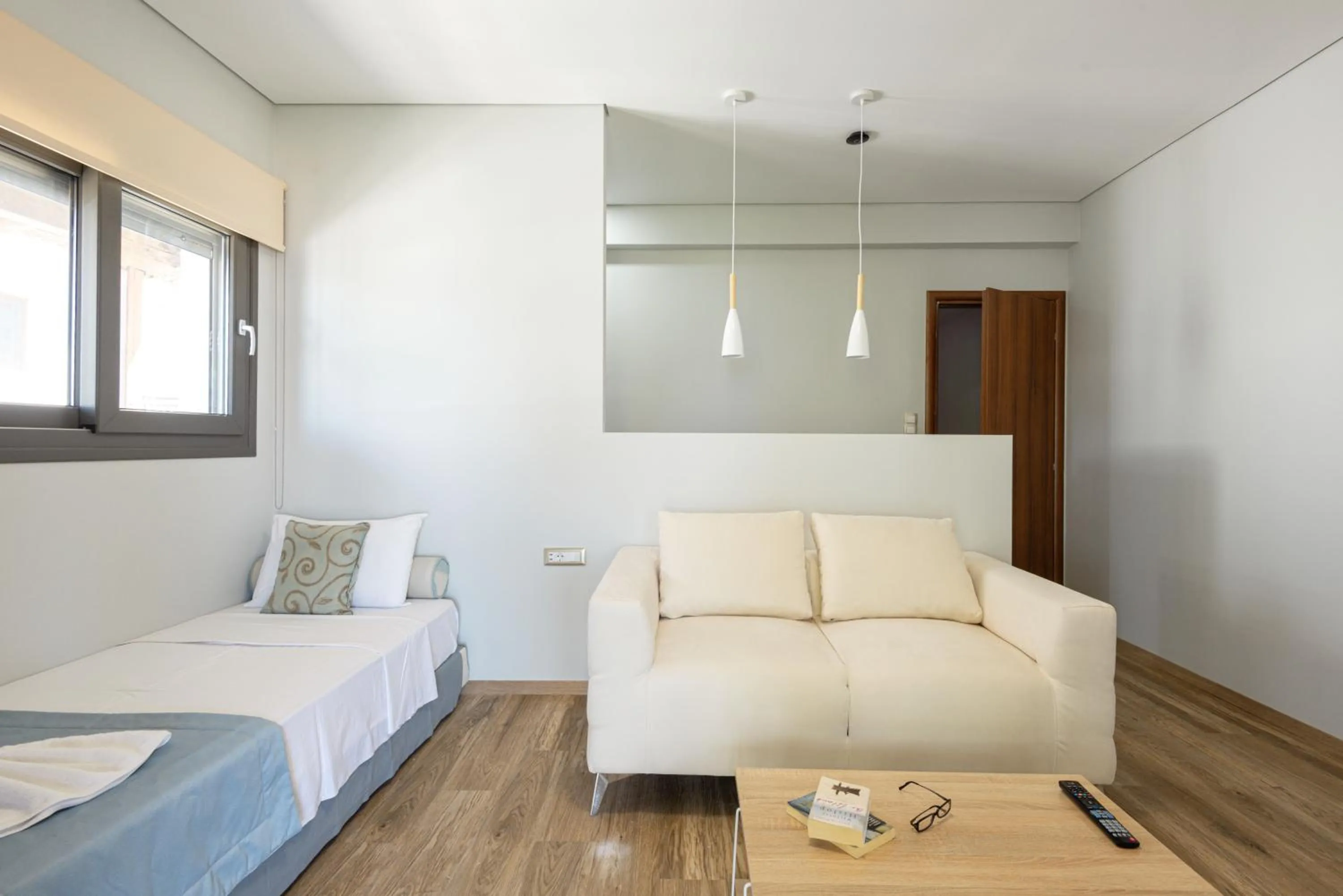 Living room, Bed in Regos Resort Hotel