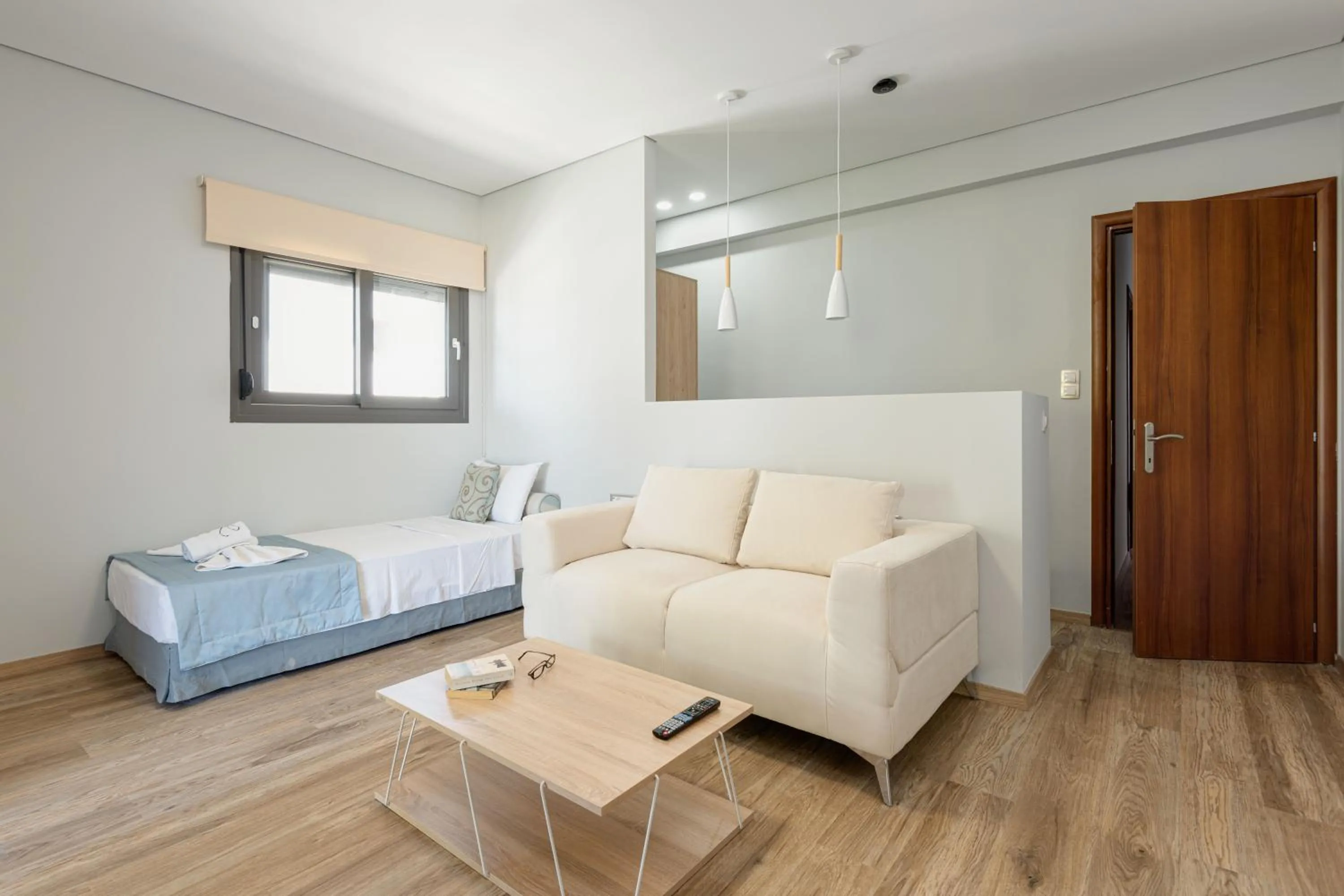 Living room, Bed in Regos Resort Hotel