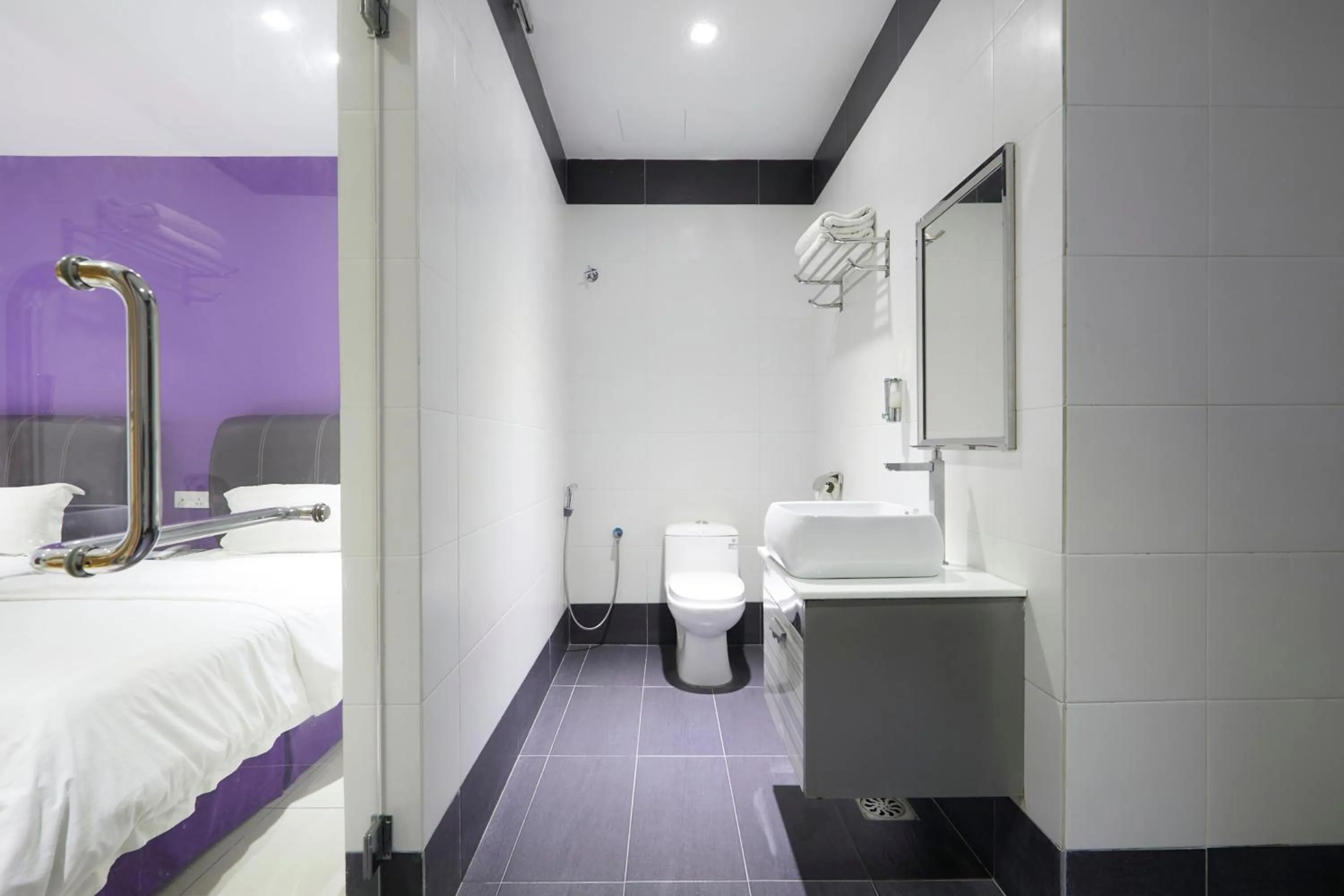 Bathroom, Bed in East Sun Hotel Sekinchan Self Check In