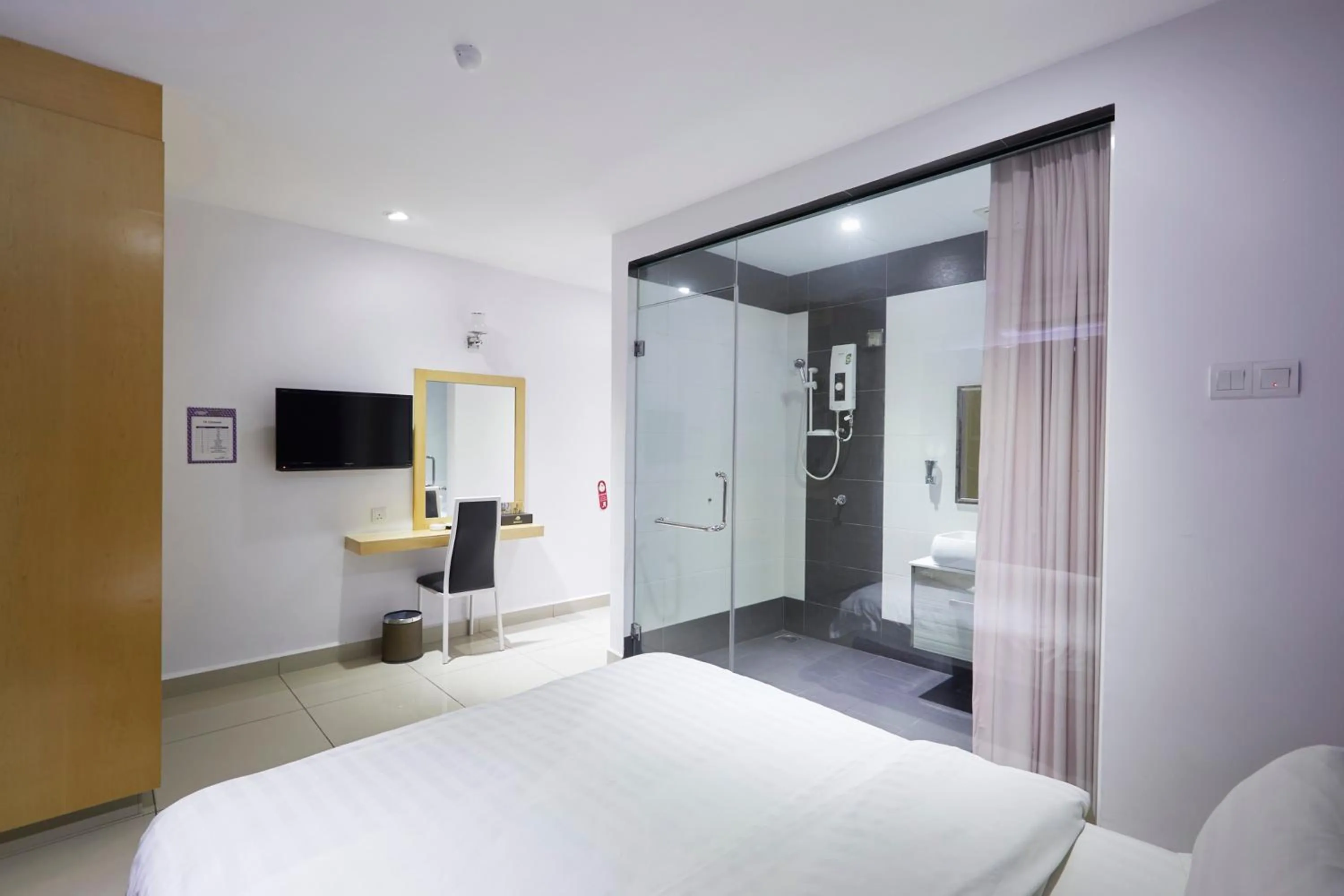 Bedroom, Bed in East Sun Hotel Sekinchan Self Check In