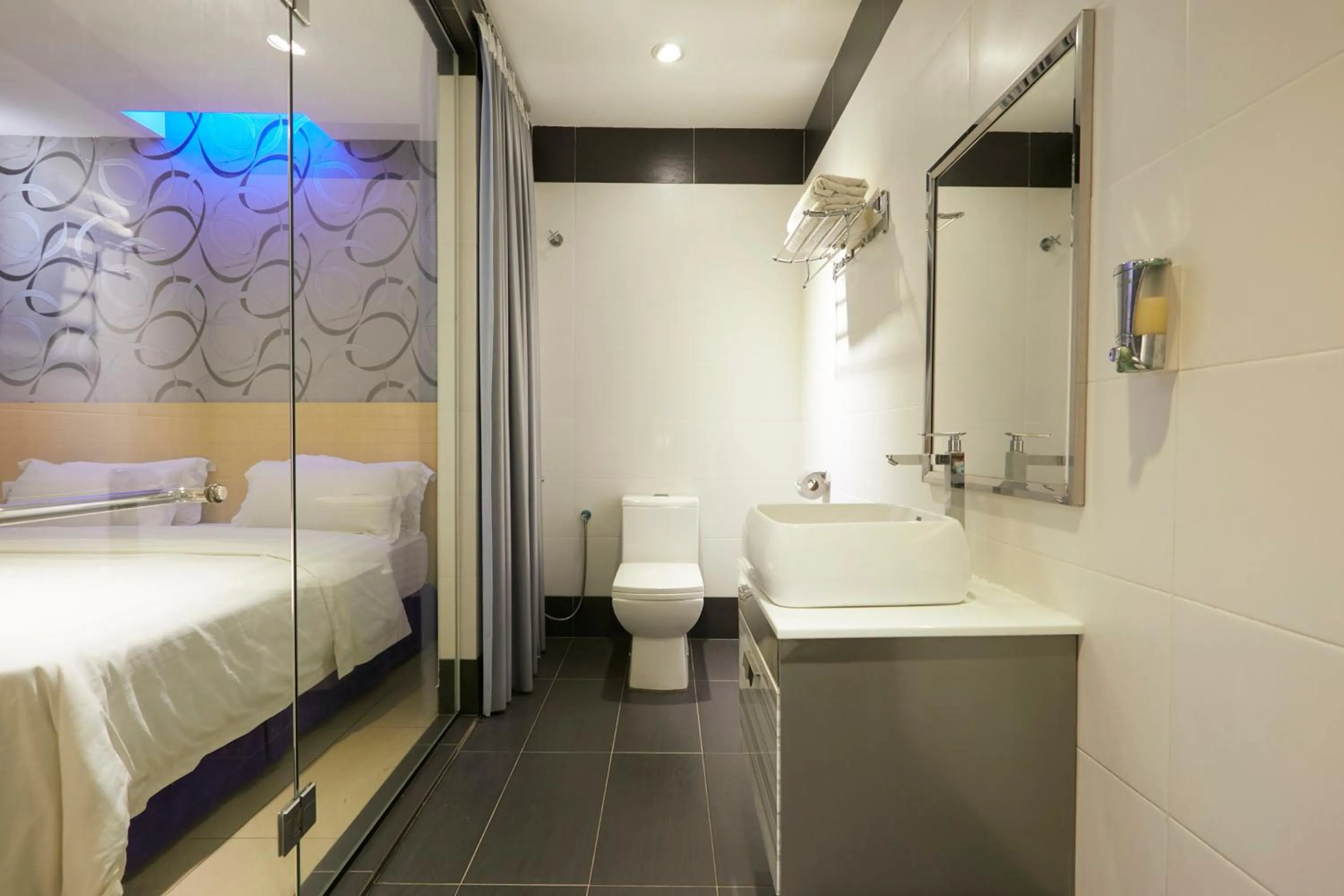 Bathroom, Bed in East Sun Hotel Sekinchan Self Check In