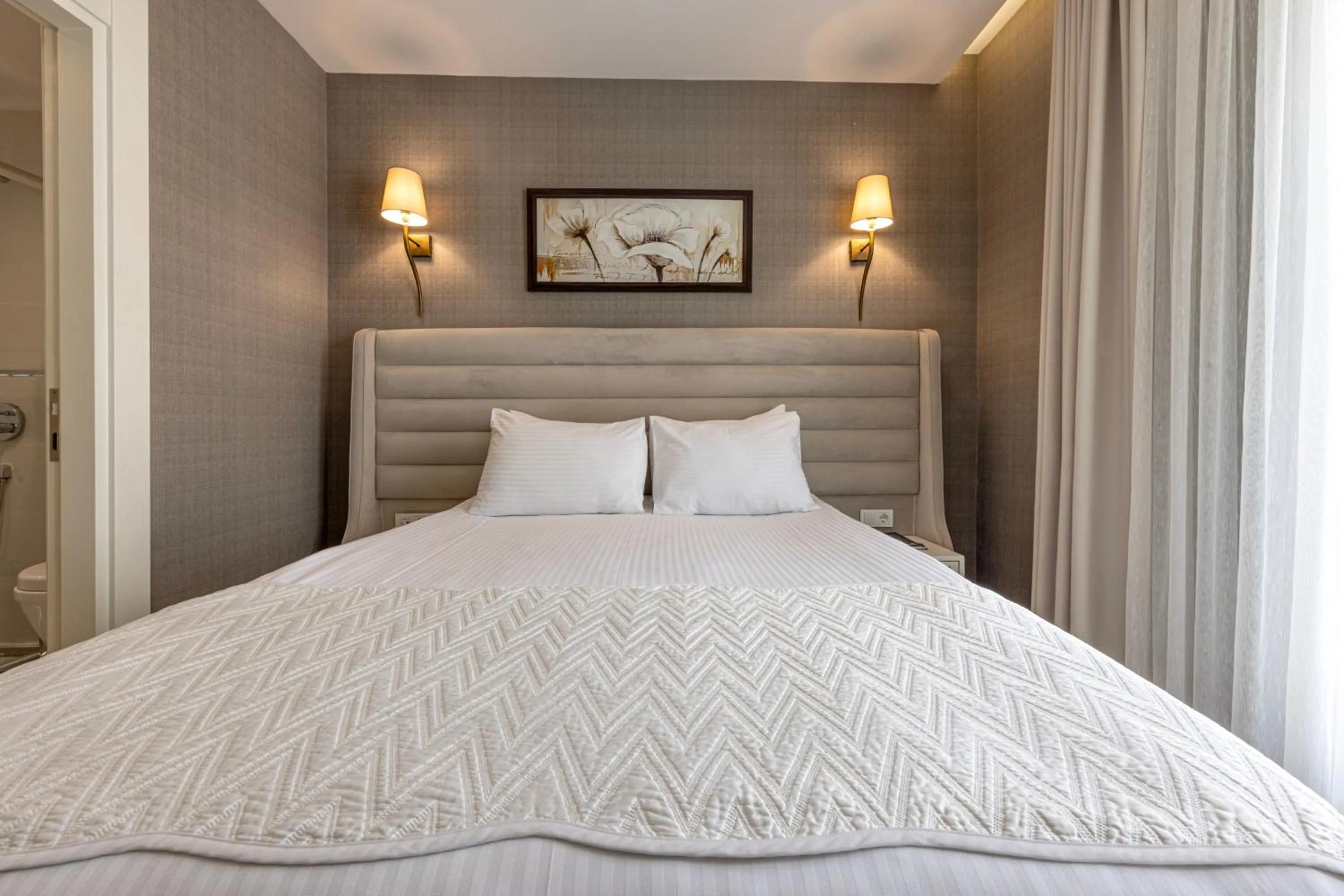 Bed in Mr BEYAZ HOTEL