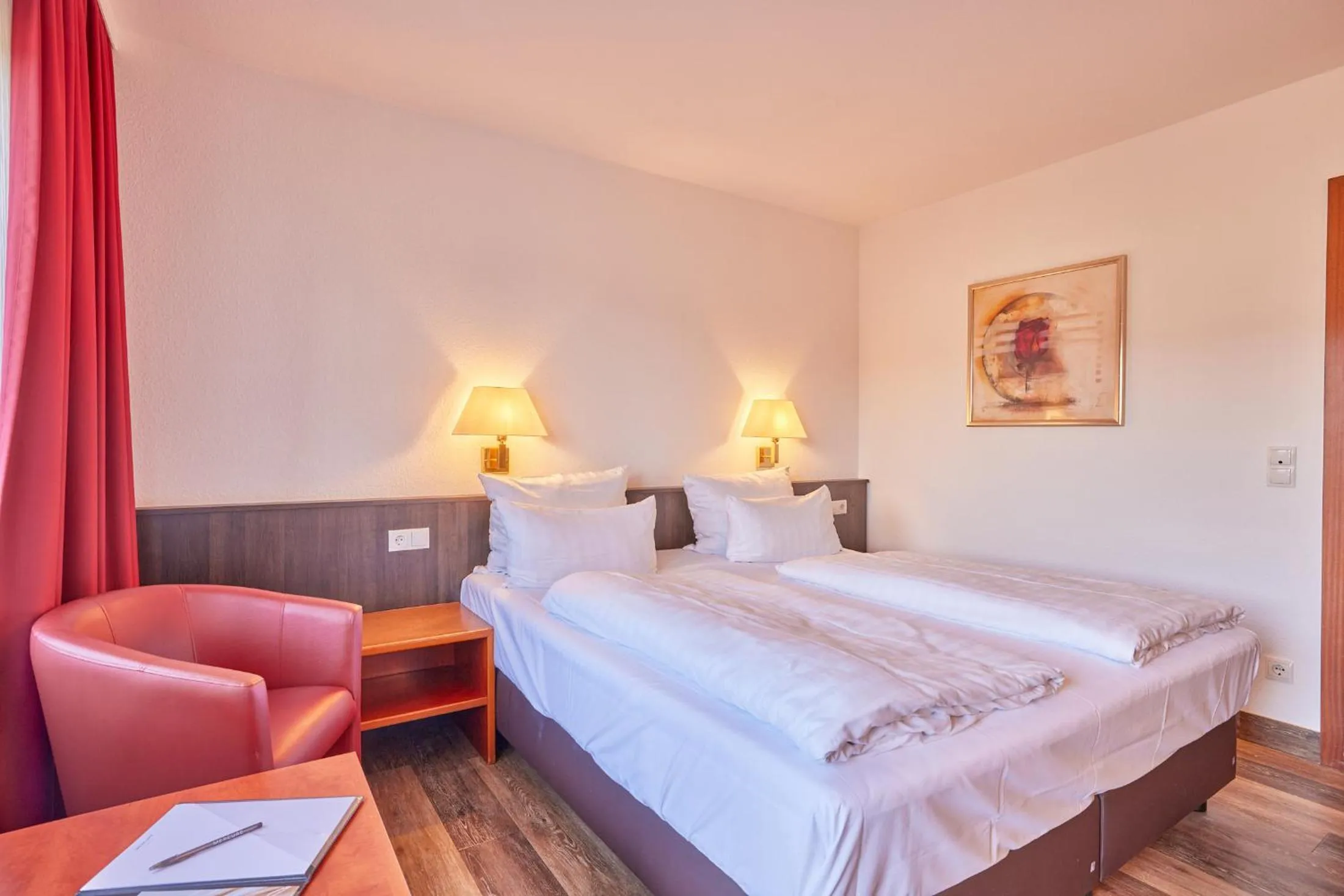 Photo of the whole room, Bed in Mercure Hotel Bad Duerkheim An Den Salinen